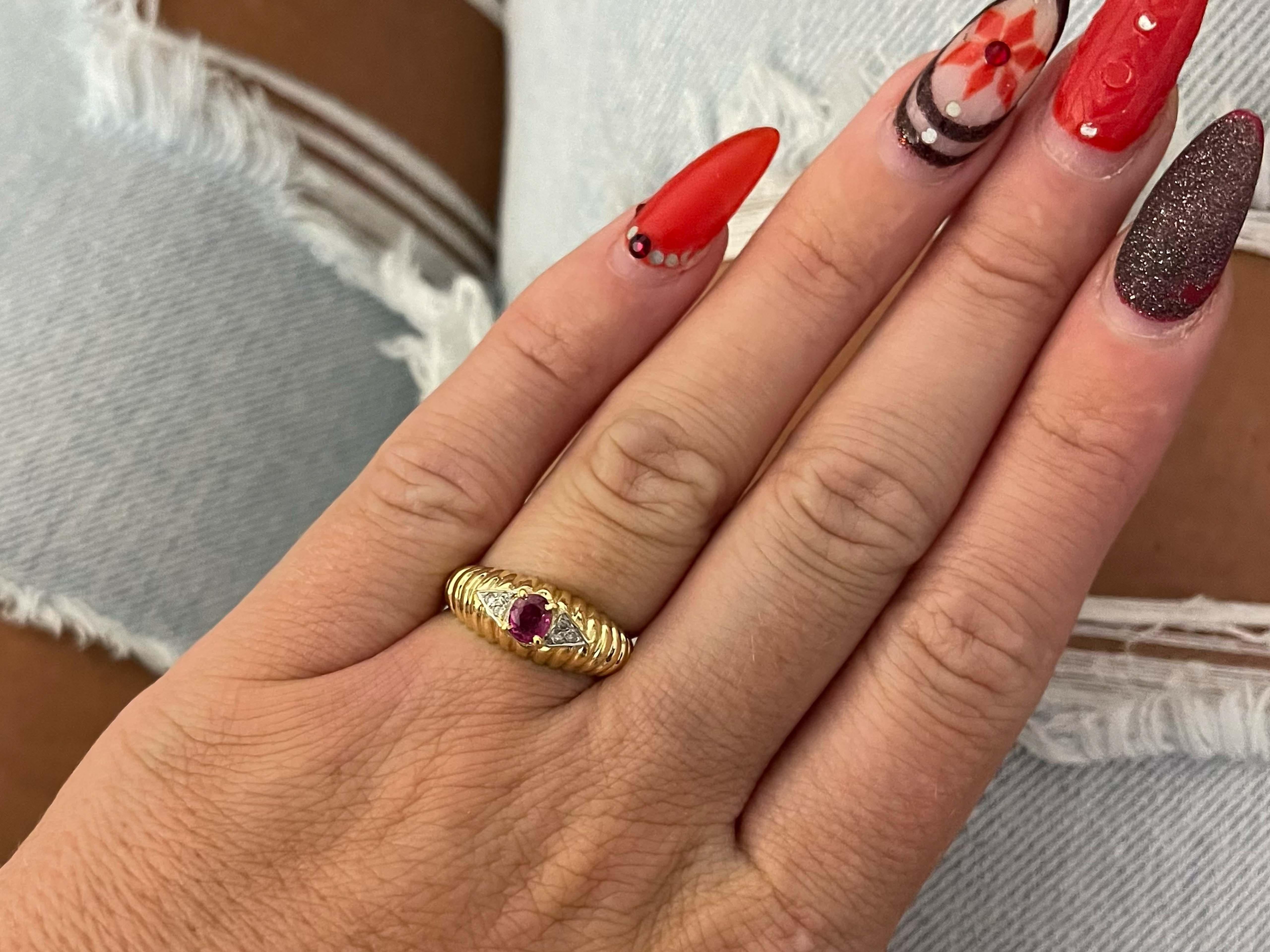 Item Specifications:

Metal: 14K Yellow Gold

Style: Statement Ring

Ring Size: 6.5 (resizing available for a fee)

Total Weight: 3.1 Grams

Ring Height: 7.6 mm

Gemstone Specifications:

Gemstone: 1 Ruby

Shape: Oval

Ruby Measurements: ~ 4.69mm x