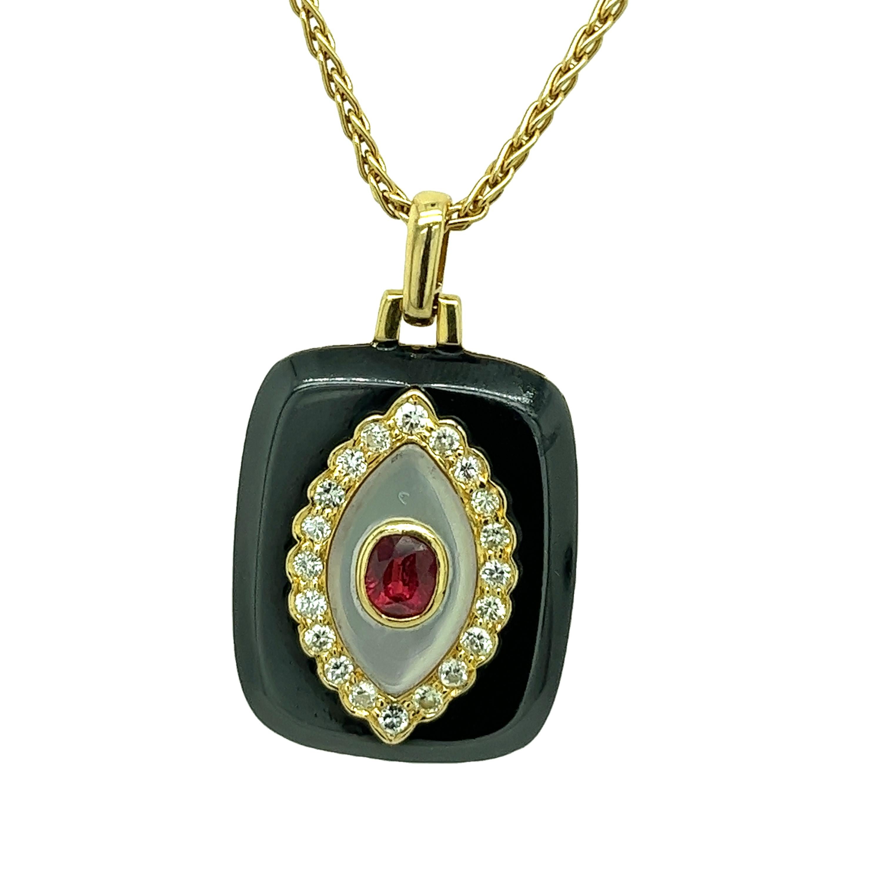 This gorgeous ruby & diamond black enameled pendant is set with an oval natural ruby and 20 round brilliant cut diamonds in 18ct yellow gold setting. The pendant is suspended from an 18-yellow gold chain that measures 20 inches.

Made by LARRY
