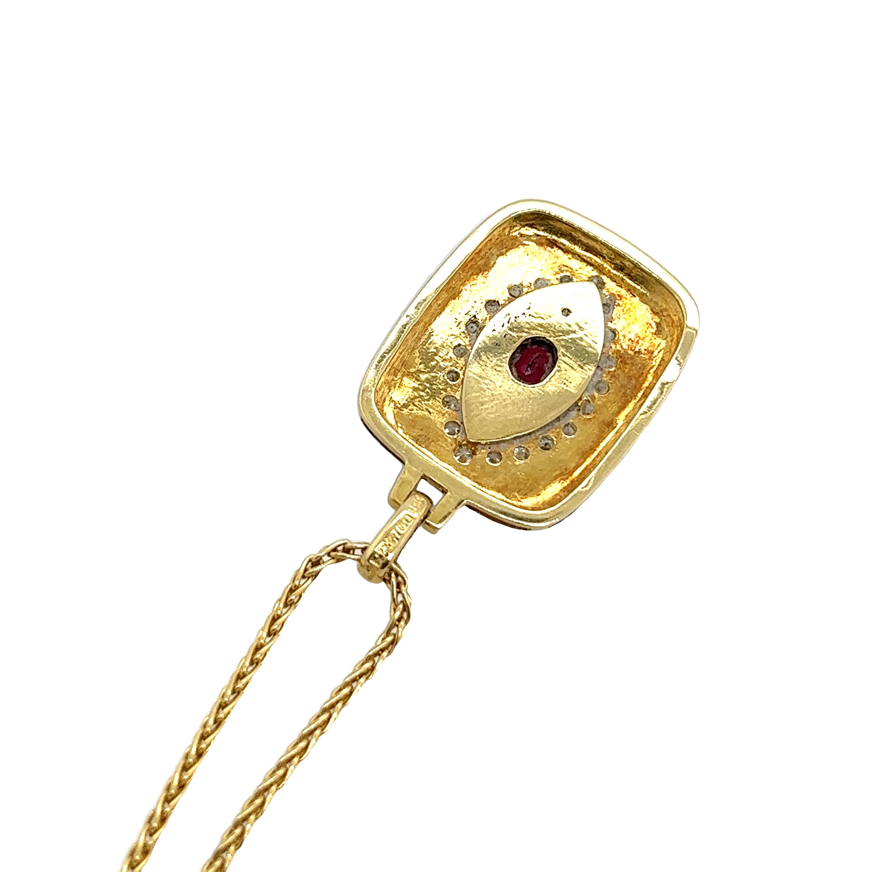 Vintage Ruby and Diamond Black Enamel Pendant Set In 18ct Yellow Gold In Excellent Condition For Sale In London, GB