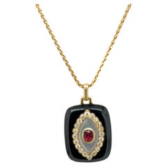 Pendentif vintage en or jaune 18ct avec rubis et diamants en émail noir