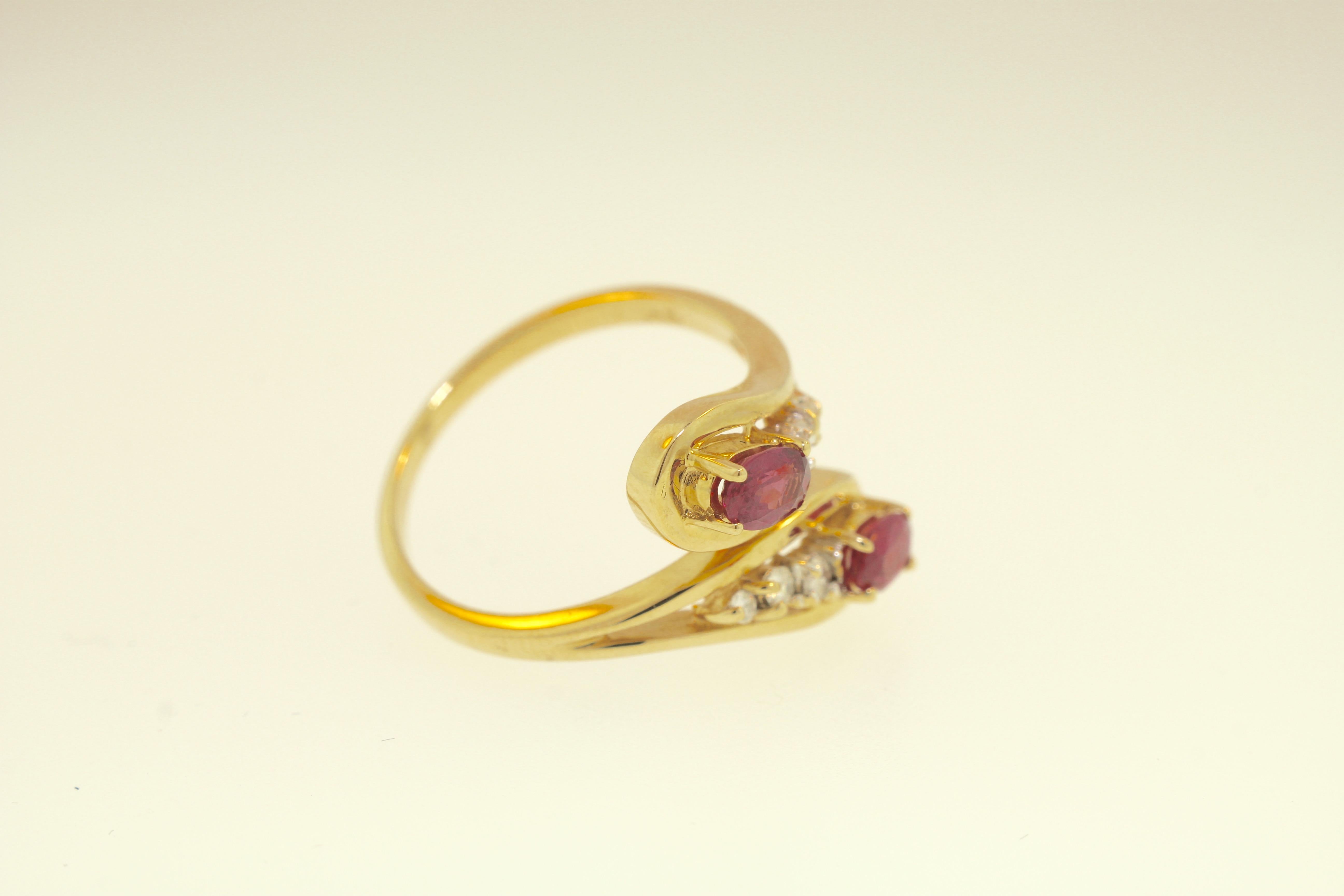 Oval Cut Vintage Ruby and Diamond Bypass 14k Yellow Gold Ring For Sale