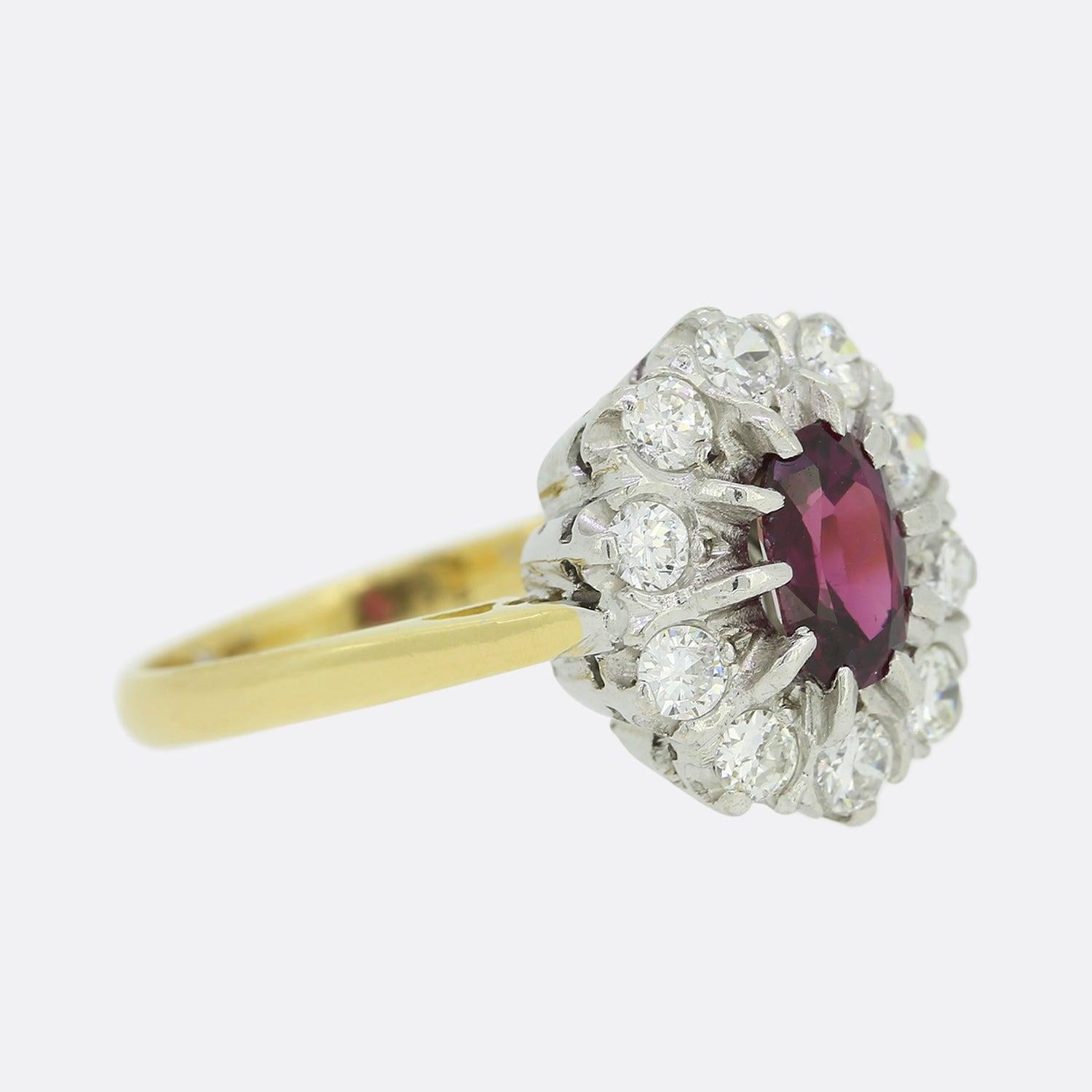 Oval Cut Vintage Ruby and Diamond Cluster Ring For Sale