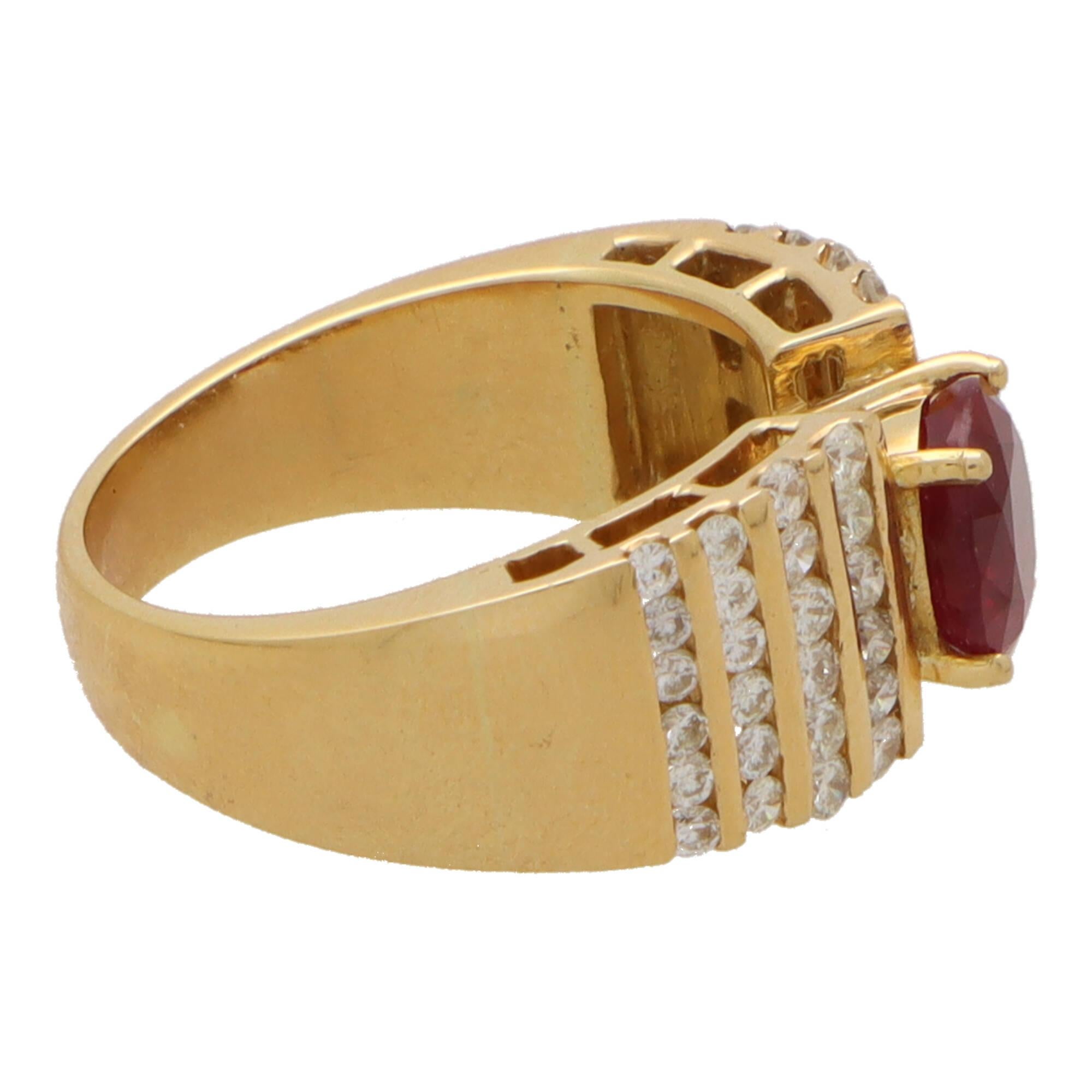  A beautiful vintage ruby and diamond dress ring set in 18k yellow gold.

This unique piece is composed in a bombe design and is centrally set with a vibrant oval cut ruby. The ruby is four claw set securely and is sided by four graduating rows of