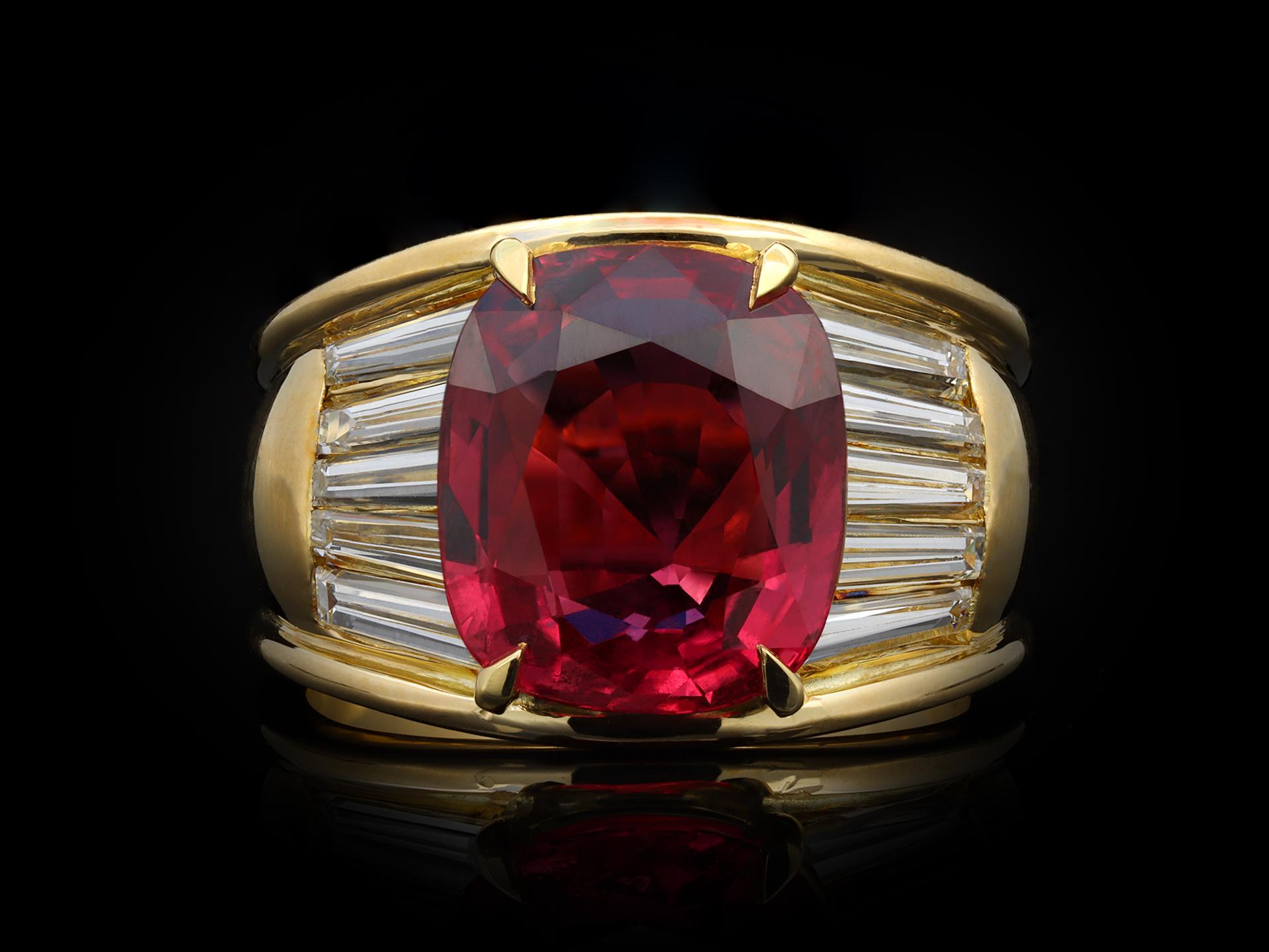Cushion Cut Vintage Ruby and Diamond Flanked Solitaire Ring, circa 1970 For Sale