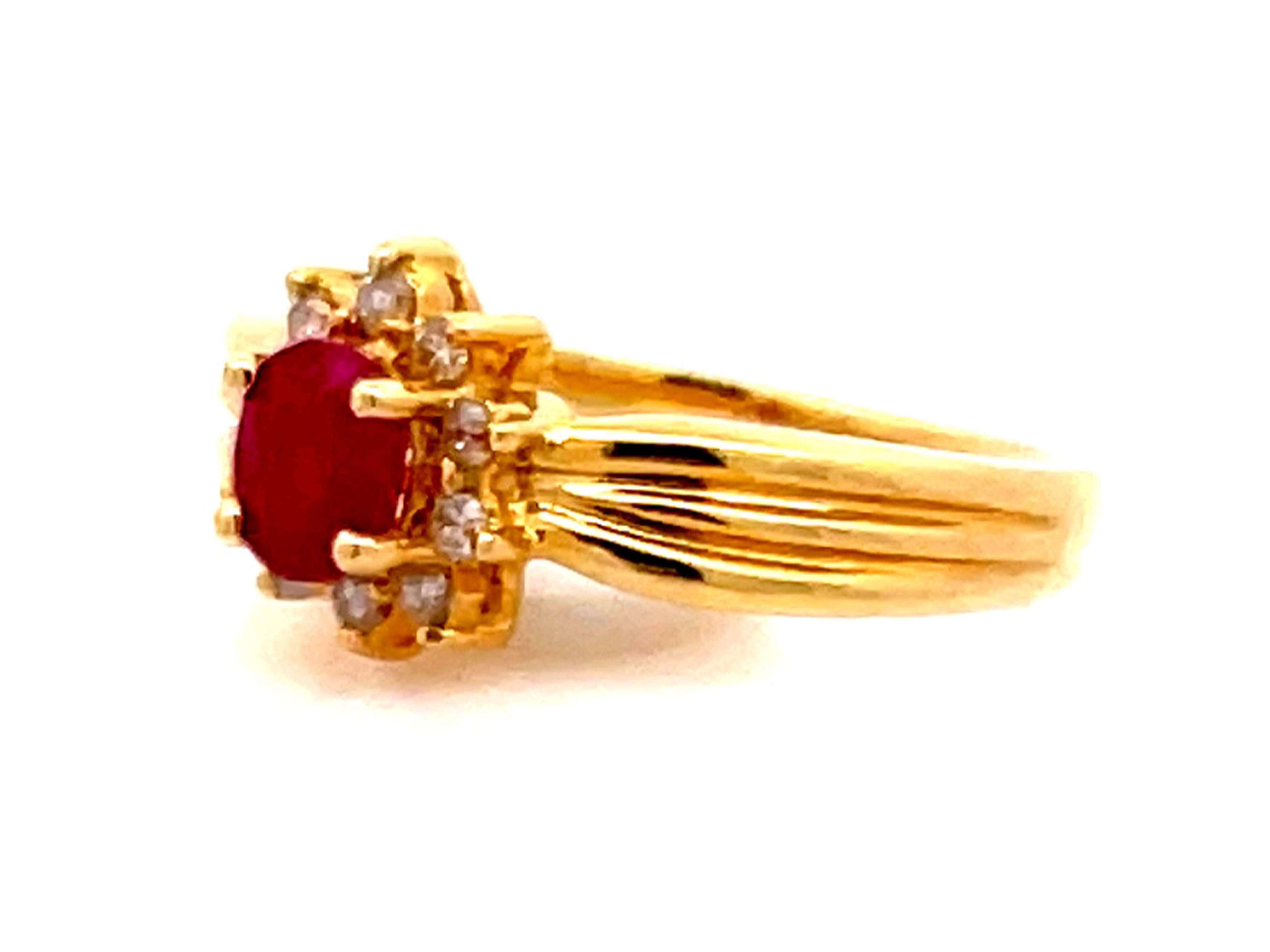Oval Cut Vintage Ruby and Diamond Flower Ring in 14k Yellow Gold For Sale