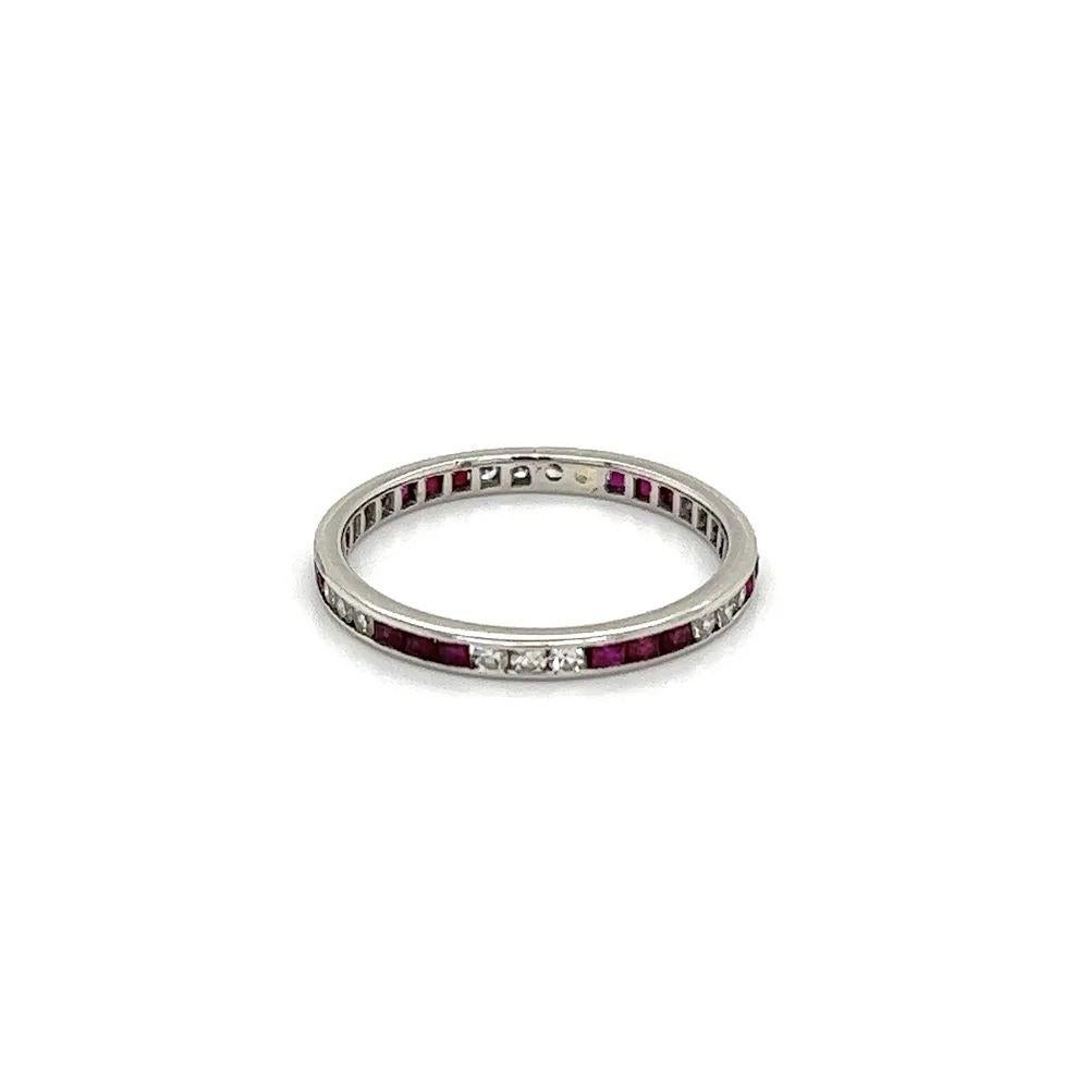 Simply Beautiful! Ruby and Diamond 2.1mm Band Ring. Securely set with alternating Diamonds, weighing approx. 0.32tcw and Rubies, weighing approx. 0.40tcw. Hand crafted in 18K White Gold. Band measures approx. 2.1mm. Ring size 7.25. More Beautiful in