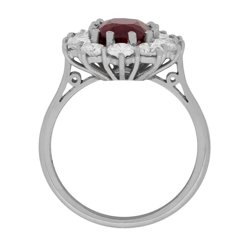 This beautiful ring has a ruby in the centre which is a wonderful deep red. The gemstone has been certified by The Gem and Pearl Lab in London, as a 2.70 carat ruby, originating in East Africa with no evidence of heat treatment. It is a stunning