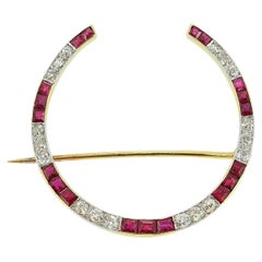 Vintage Ruby and Diamond Horseshoe Brooch