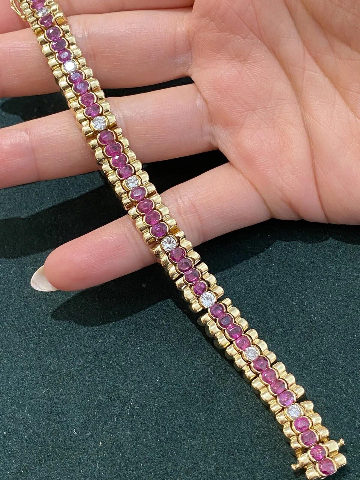 Vintage Ruby and Diamond Bracelet In 18K Yellow Gold

Ruby and Diamond Bracelet features 37 Oval Red Rubies and 8 Round Brilliant cut Diamonds set in an alternating pattern in a single row in 18K Yellow Gold.

Total ruby weight is 7 carats
