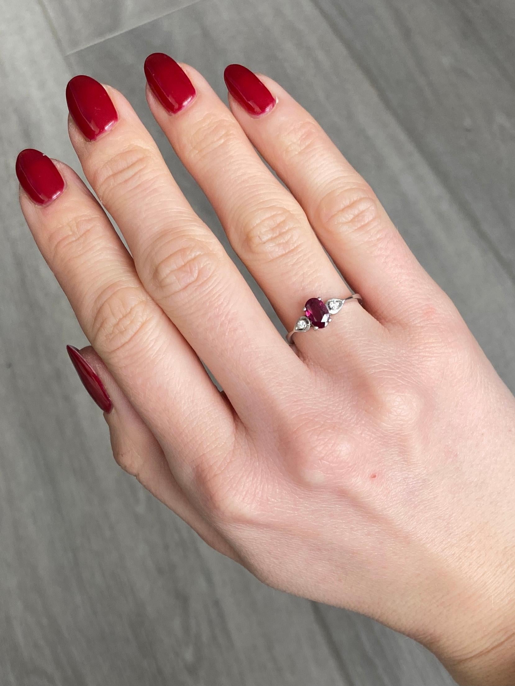 Oval Cut Vintage Ruby and Diamond Platinum Three-Stone Ring For Sale