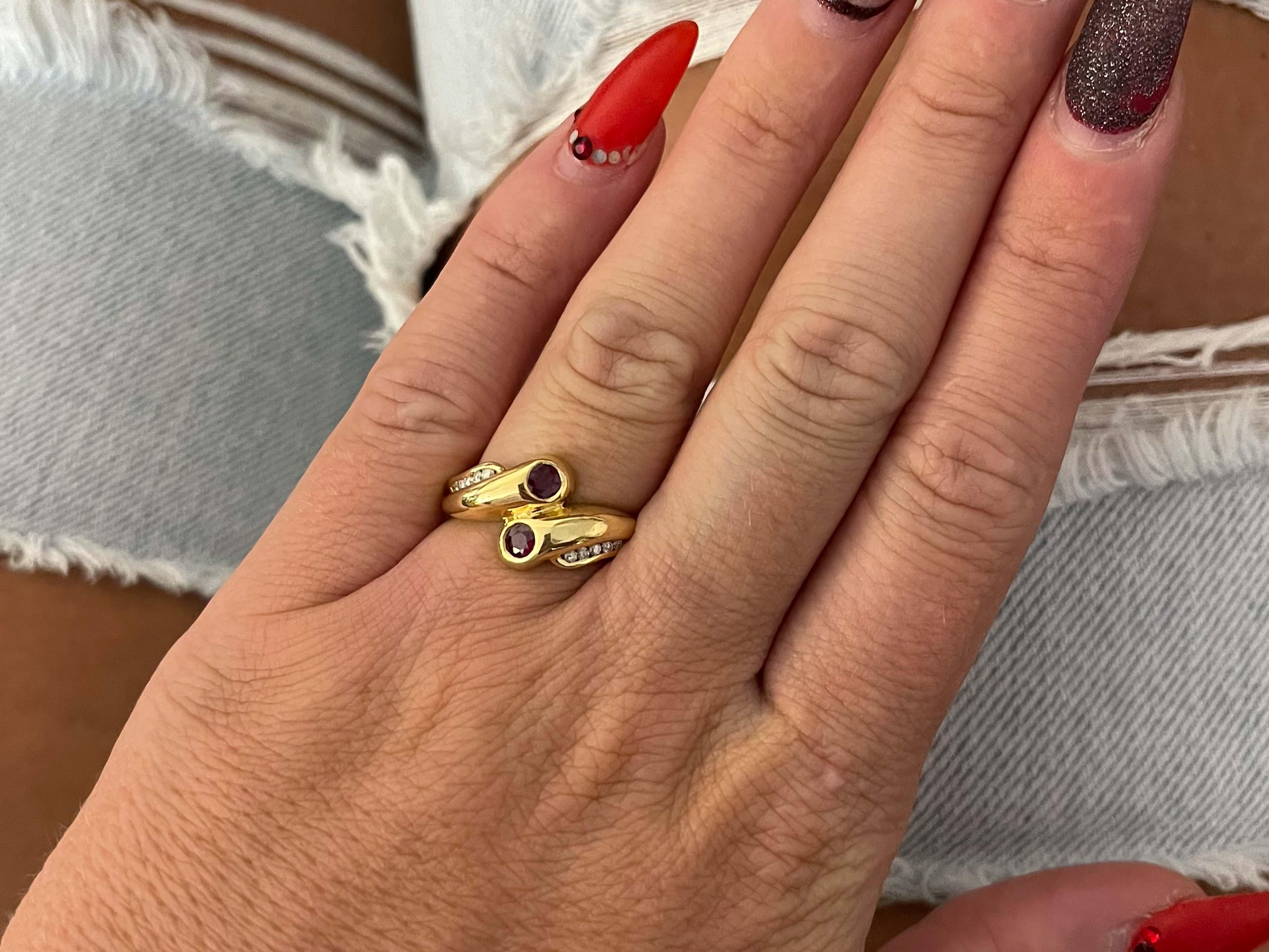Item Specifications:

Metal: 14K Yellow Gold

Style: Statement Ring

Ring Size: 8 (resizing available for a fee)

Total Weight: 4.60 Grams

Ring Height: 11.5 mm

Gemstone Specifications:

Gemstone: 2 Ruby

Shape: Round

Diameter: ~6 mm
​
​Ruby Carat