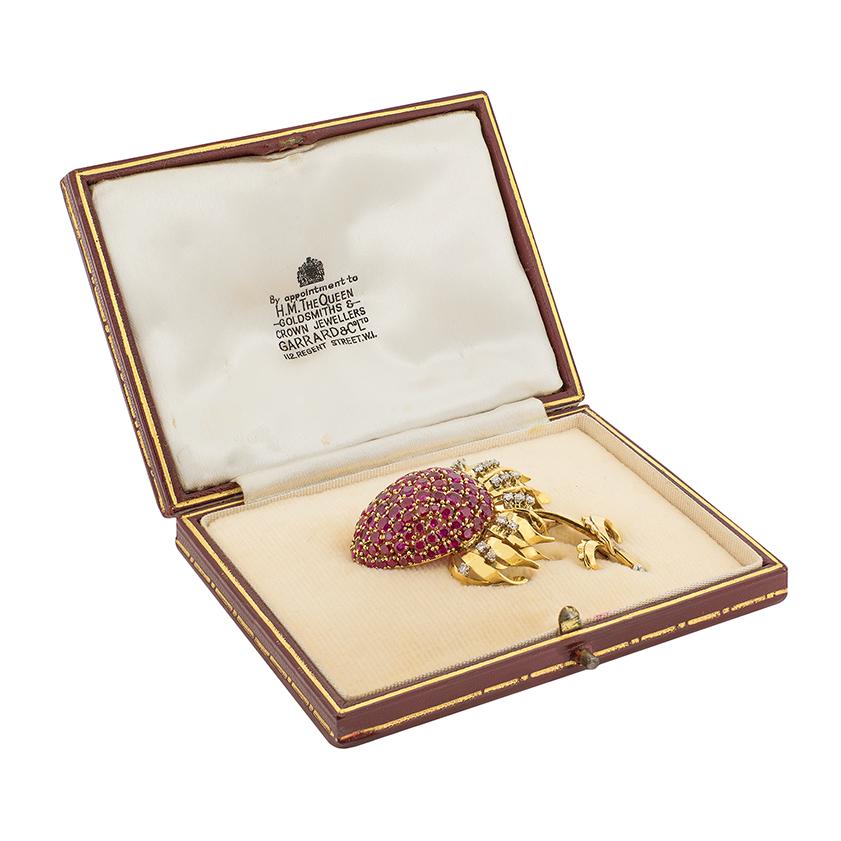 Round Cut Vintage Ruby and Diamond Thistle Brooch, circa 1960s For Sale