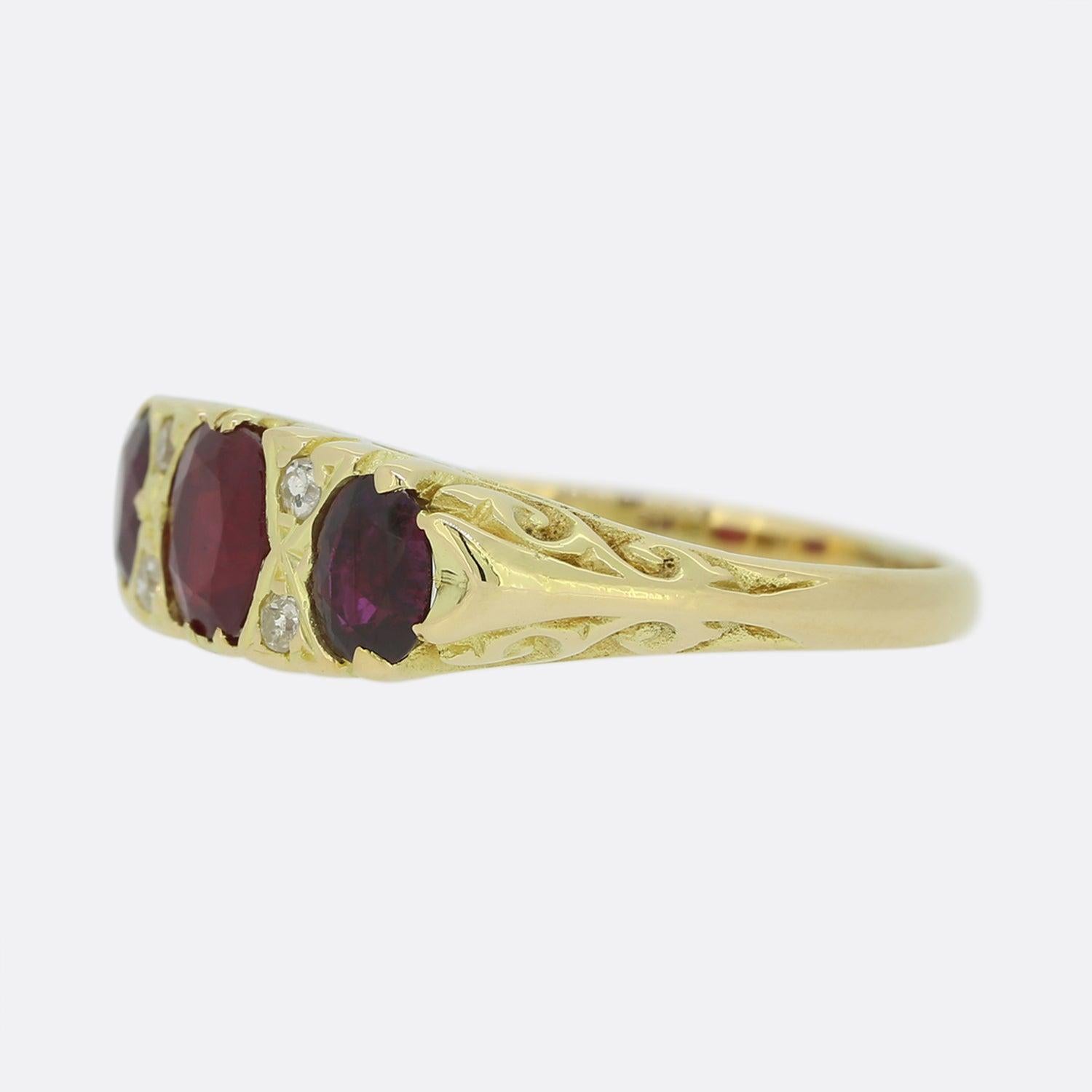 This is a vintage 18ct yellow gold ruby and diamond ring. Each ruby features a highly desirable rich red hue and the centre stone is slightly large than the other two. Separating the rubies there are four 'eight' cut diamonds.

Condition: Used (Very