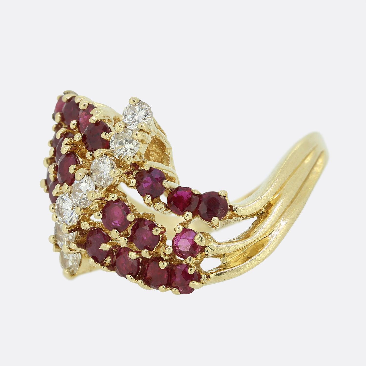 Here we have a 14ct yellow gold ruby and diamond twist ring. The rubies are perfectly matched and a rich red hue, which highly compliments the bright white sparkle of the central round brilliant cut diamonds.

Condition: Used (Very Good)
Weight: 7.2