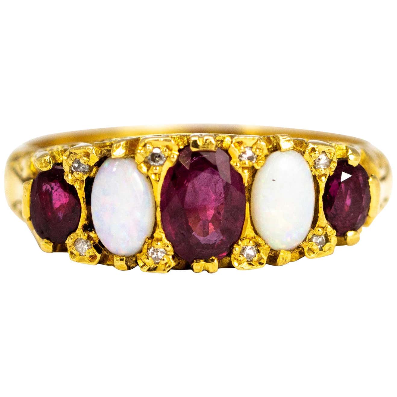Vintage Ruby and Opal 18 Carat Gold Five-Stone Ring For Sale at 1stDibs