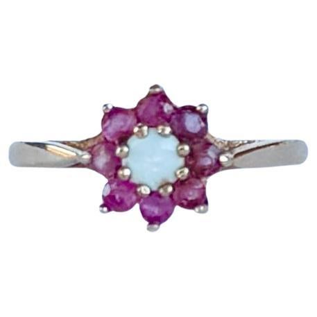 Vintage-Cluster-Ring mit Rubin und Opal aus 9 Karat Gold