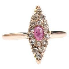 Bague vintage en or rose 14 carats avec cabochon de rubis et navette en diamants taille rose 