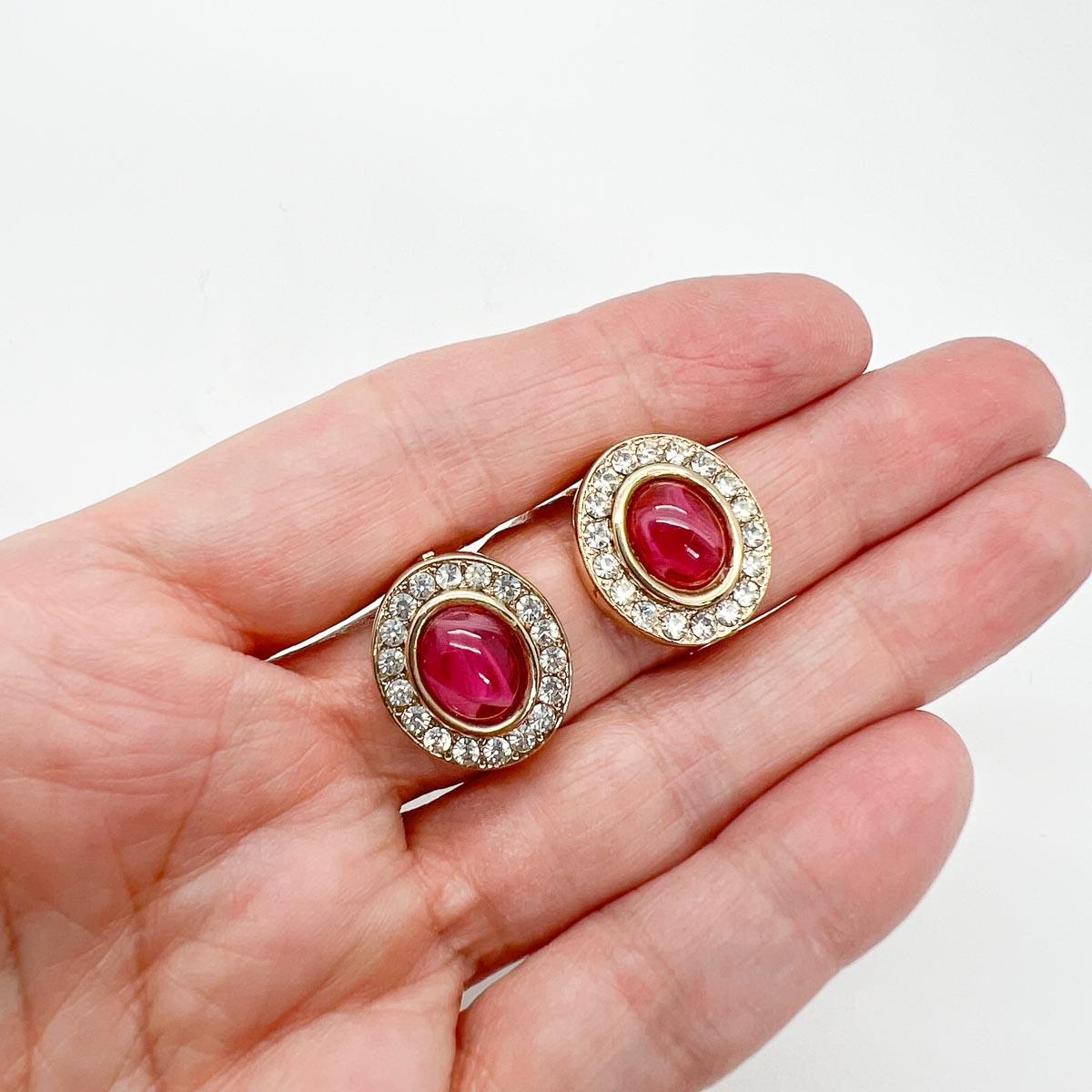 A beautiful pair of Vintage Ruby Cabochon Earrings. A cabochon stone always adds the look of luxury and has timeless appeal.
An unsigned beauty. A rare treasure. Just because a jewel doesn’t have a designer name, doesn’t mean that isn’t coveted. The