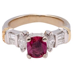 Anello vintage con rubino e diamante in oro bianco 14K