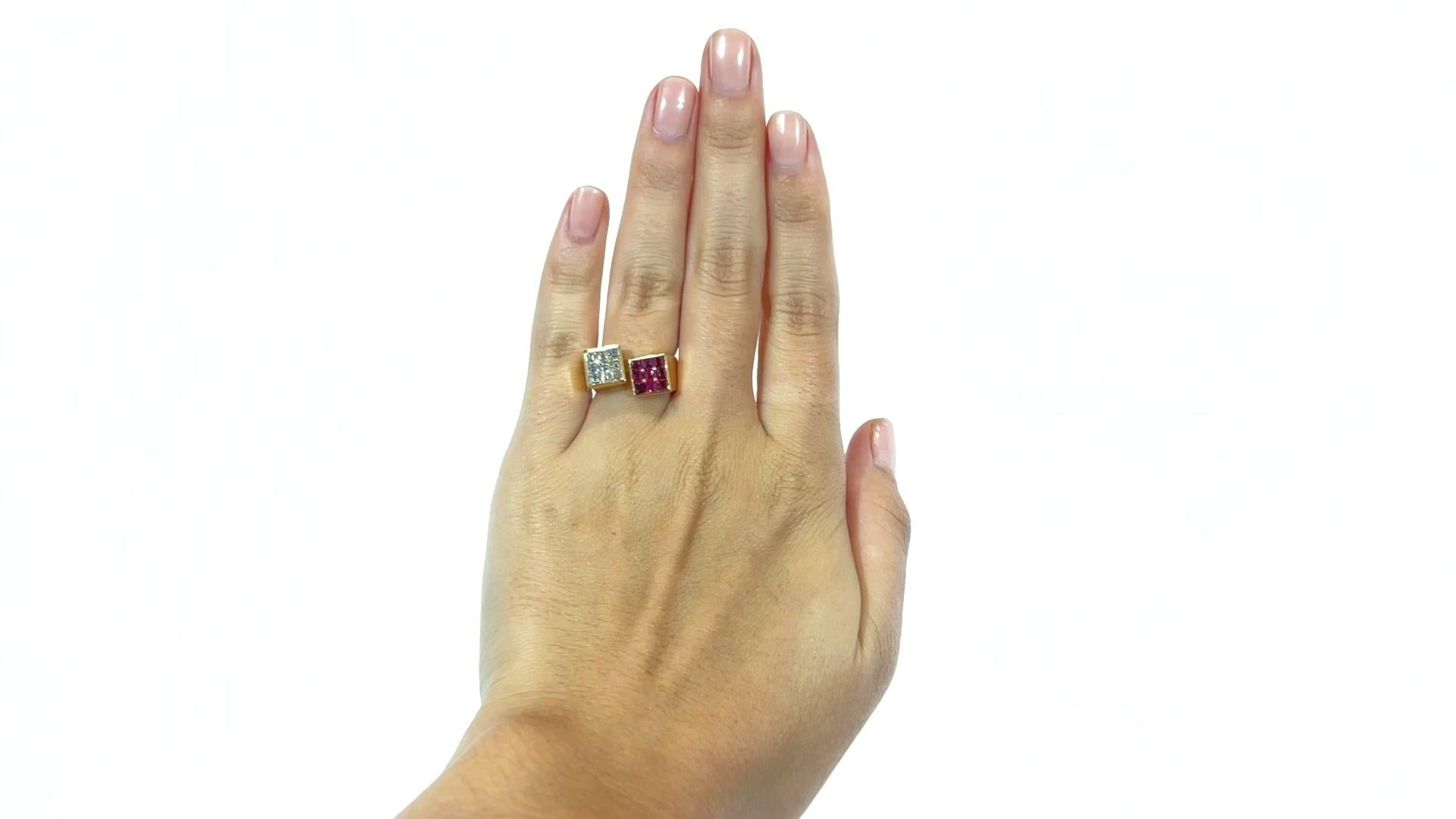 Vintage Ruby Diamond 18 Karat Gold Bypass Ring. Featuring 9 square cut rubies approximately  1.80 carats as well as  9 square emerald cut diamonds approximately 1 carat  F-G color, VS-SI clarity. Circa 2000s.

About the piece: A good looking vibrant