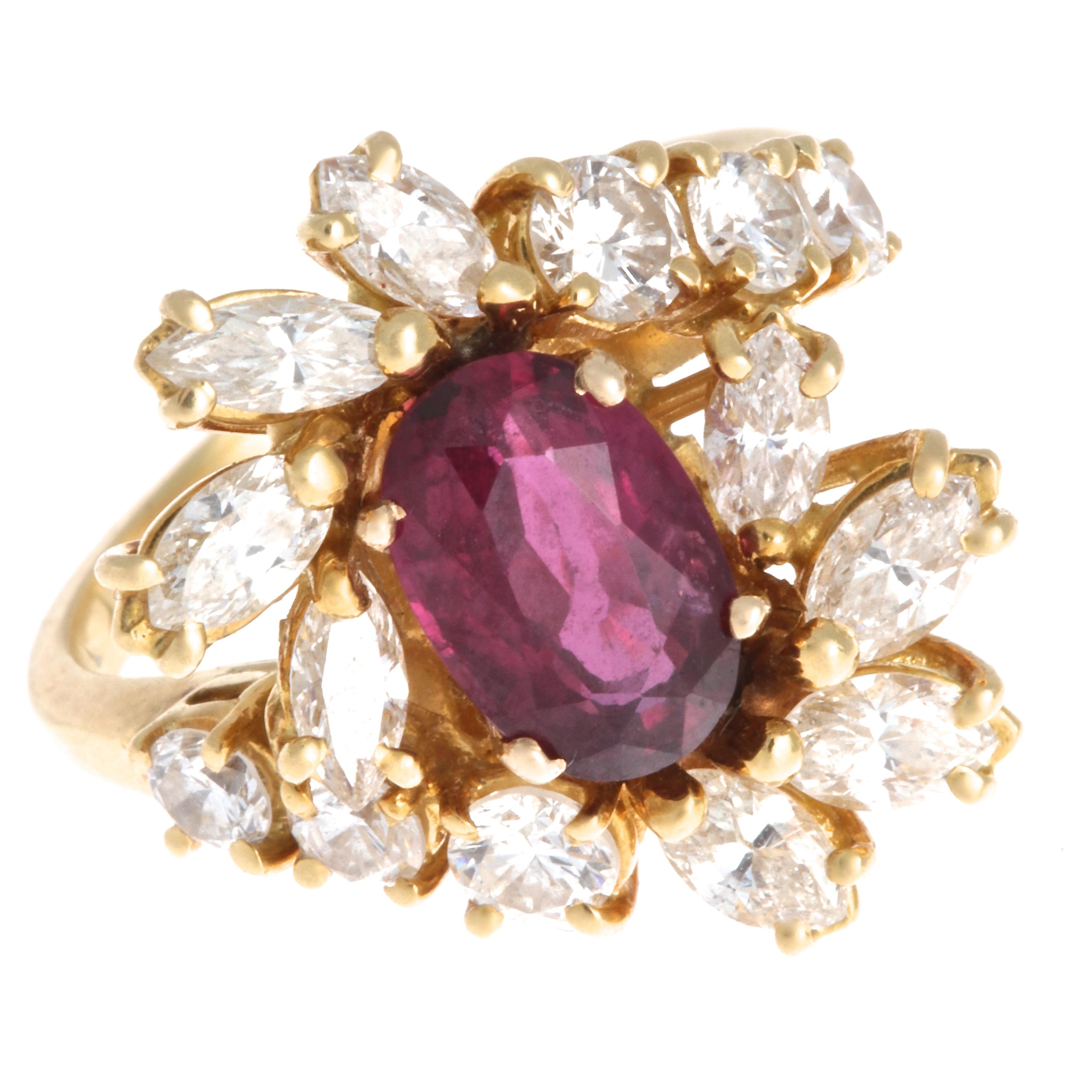 Rubies have been known as a symbol of power, wealth, royalty, and protection. Even in The Wizard of Oz, Dorothy's ruby slippers were thought to protect her from evil. This gorgeous vintage ruby  cluster ring can become your own talisman. The oval