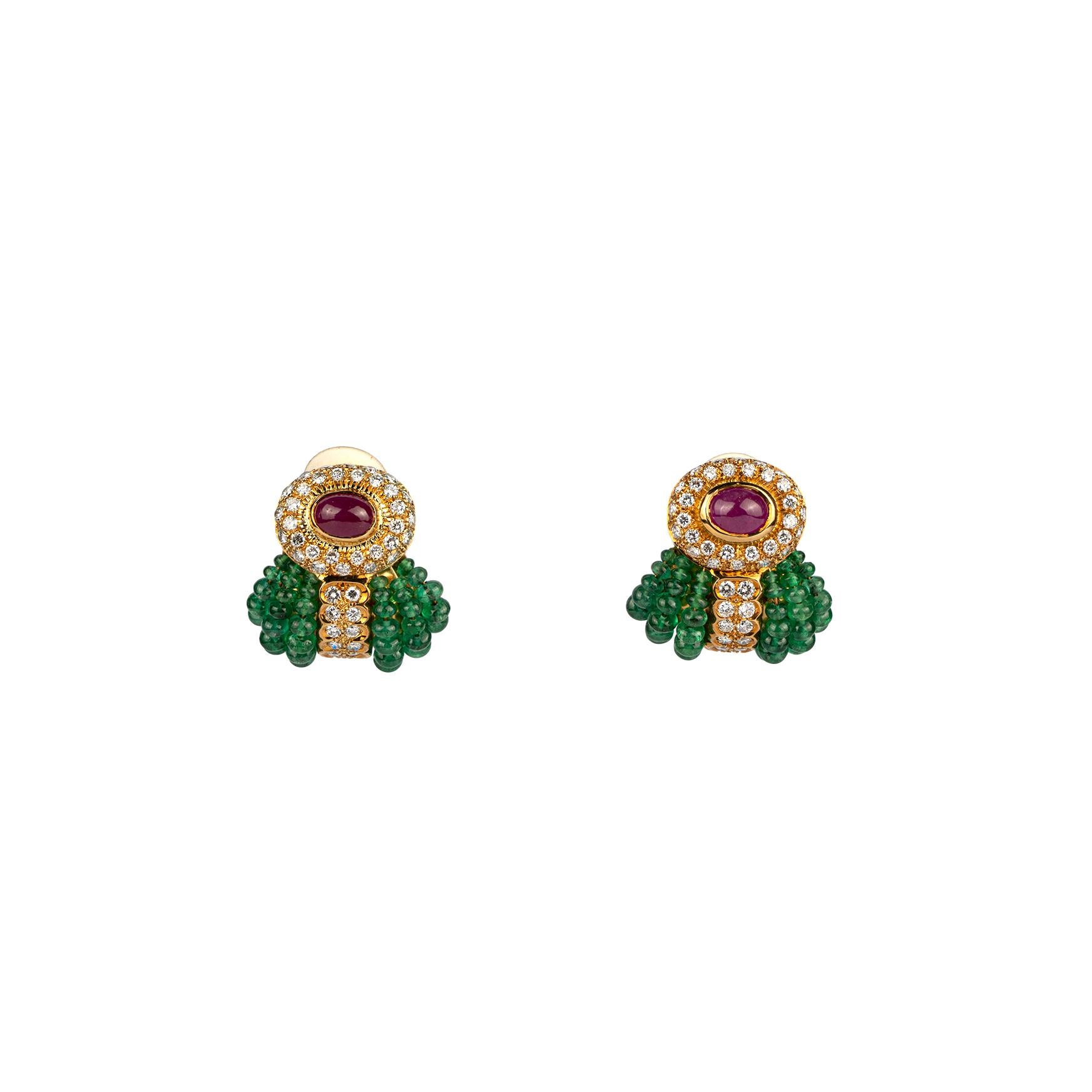 An exquisite pair of cabochon ruby and emerald beaded earrings with diamond surround. Made in Italy, circa 1970.