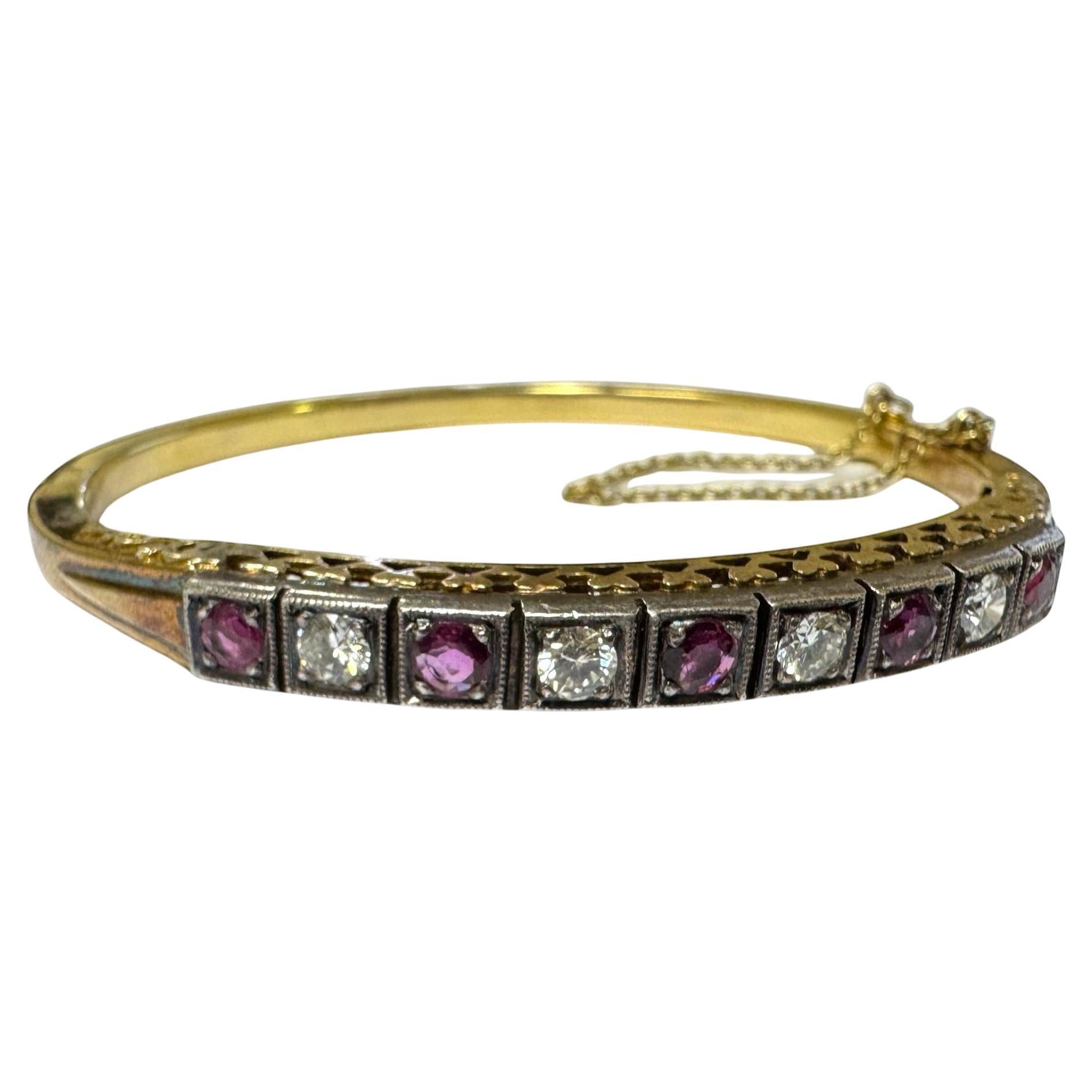 Pulsera vintage de rubíes y diamantes en oro amarillo de 14 quilates