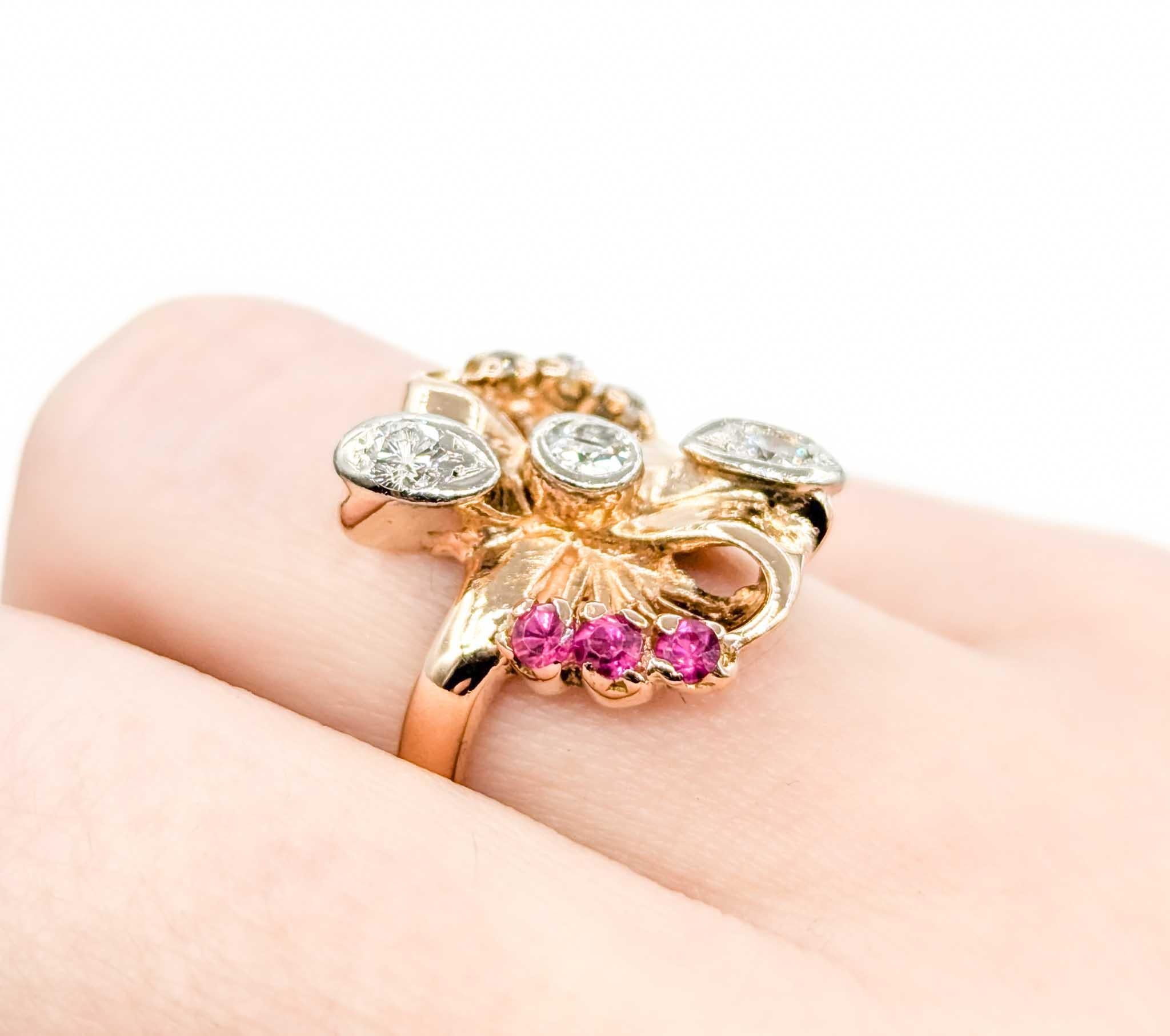 Vintage Ruby & Diamond Ring in 14k Rose Gold

This stunning ring is crafted in 14k rose gold and features a 0.25ctw round diamond centerpiece, complemented by 0.09ctw of ruby gemstones, the birthstone for July. Rubies are known for their rich red