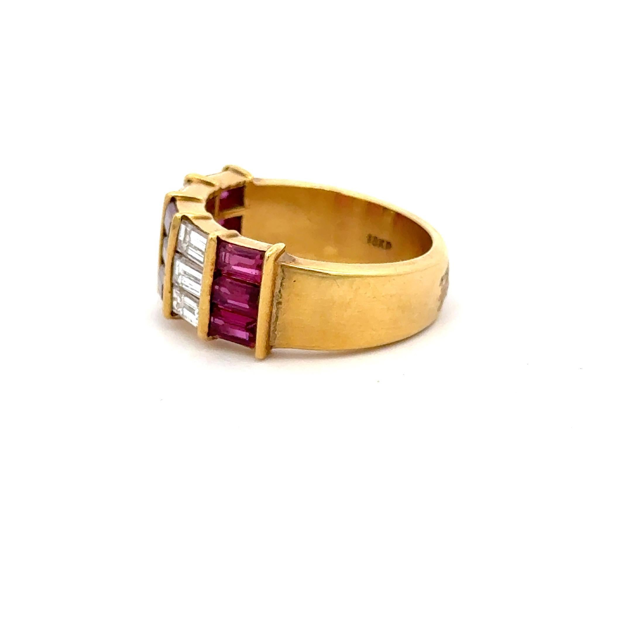 18 Karat yellow gold 5 section band featuring alternating Rubies weighing 1.50 carats and Diamonds weighing 1.35 carats.

More Vintage Bands in Stock
Message for Pictures & Details.

