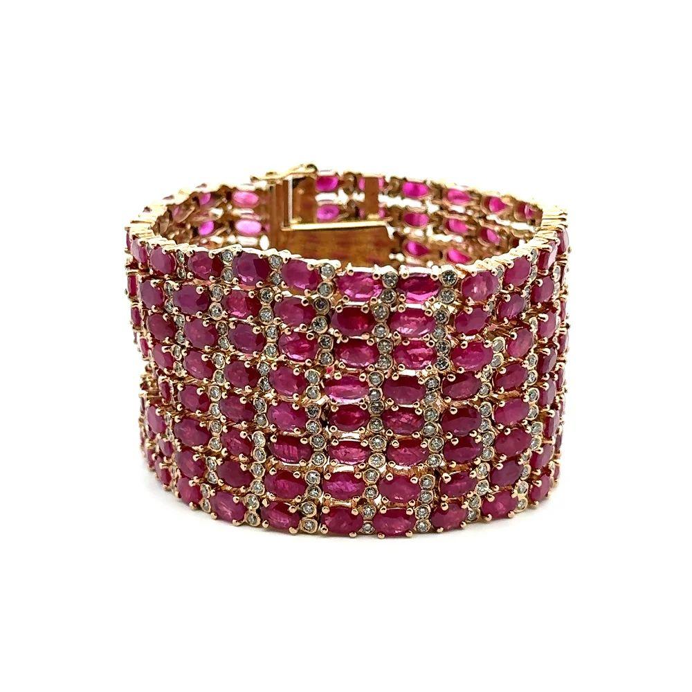Simply Beautiful!  Vintage Ruby GIA and Diamond Gold Wide Statement Bracelet. Featuring eight (8) rows Oval Rubies, weighing approx. 120tcw inter-spaced with Diamonds, approx. 9.00tcw.  GIA Certificate #5234317277. Hand crafted in 14K Yellow Gold.