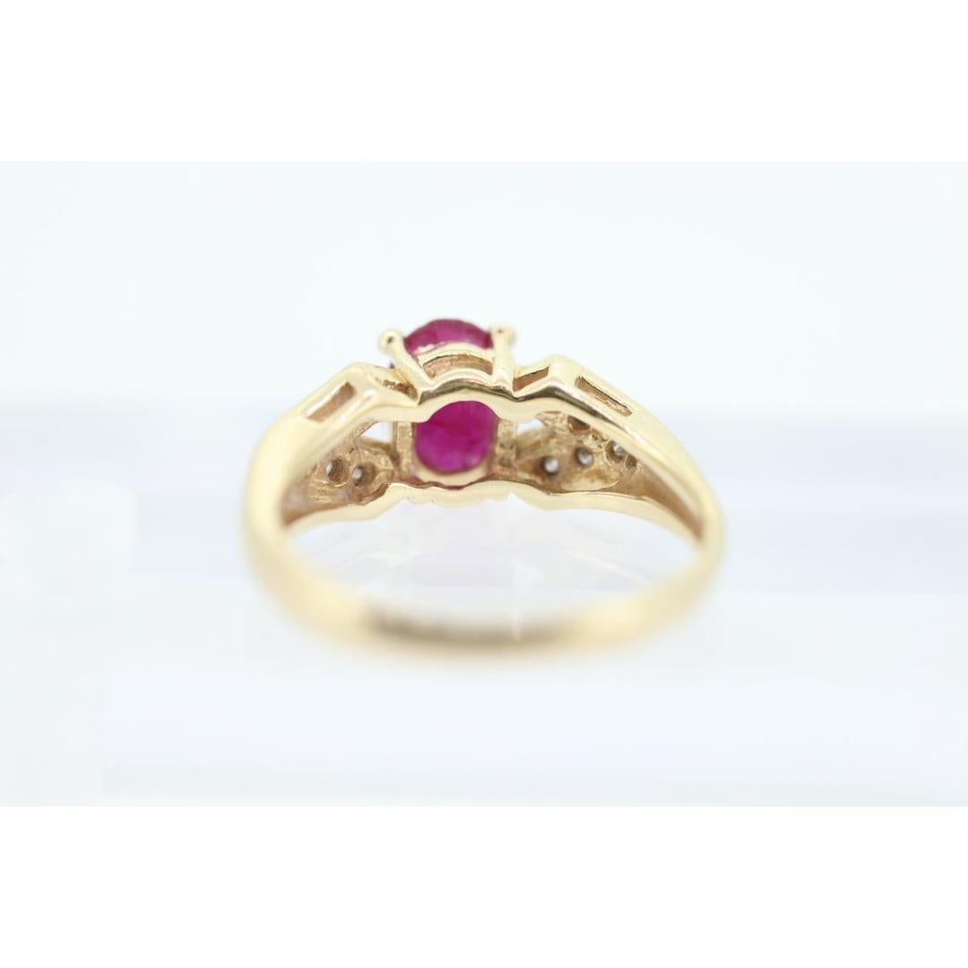 Vintage from the 1980s
Materials: Stone
Gemstone: Ruby
Gem color: Red
Band color: Gold
Adjustable
Style: Avant garde
Amazing find. Beautiful Ruby and Diamond Solitaire design ring.

Condition: Ruby has small scratches. Nothing visible with naked