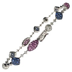 Bracelet vintage en or blanc 18 carats avec rubis, saphirs et diamants