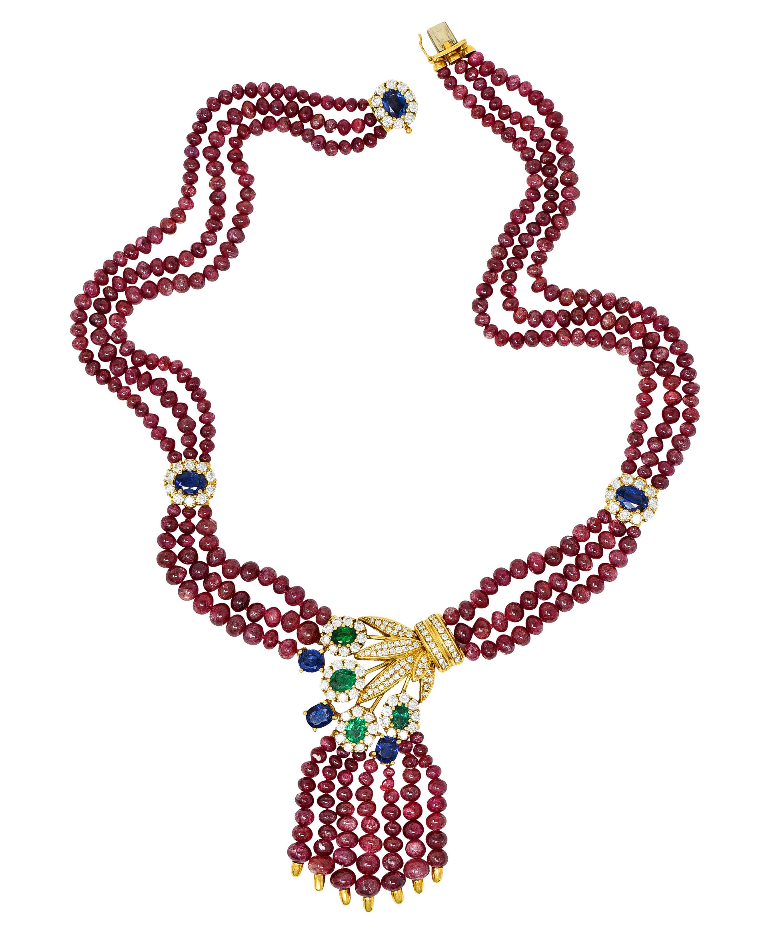 Multi-strand necklace is comprised primarily of 300.00 carats of ruby beads measuring 6.0 mm to 3.5 mm

Slightly purplish red in color and translucent with natural inclusions - some beads exhibiting slight to moderate chatoyancy

With three sapphire