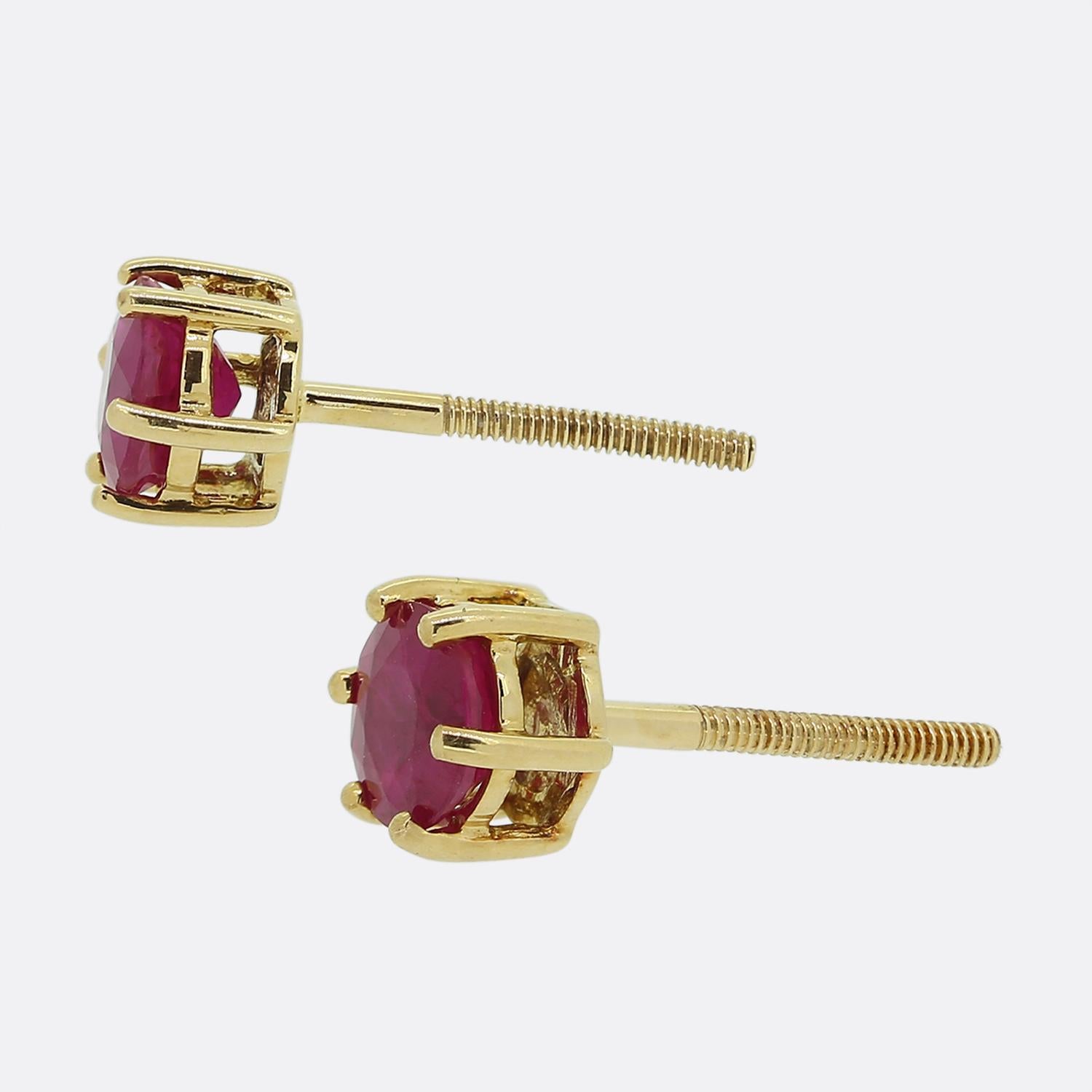 Here we have a charming pair of classically styled ruby stud earrings. Each piece showcases a single 0.50ct round faceted ruby in a 6 clawed setting. Both stones are perfectly matched and possess a vivid red colour with slight pinky undertone.