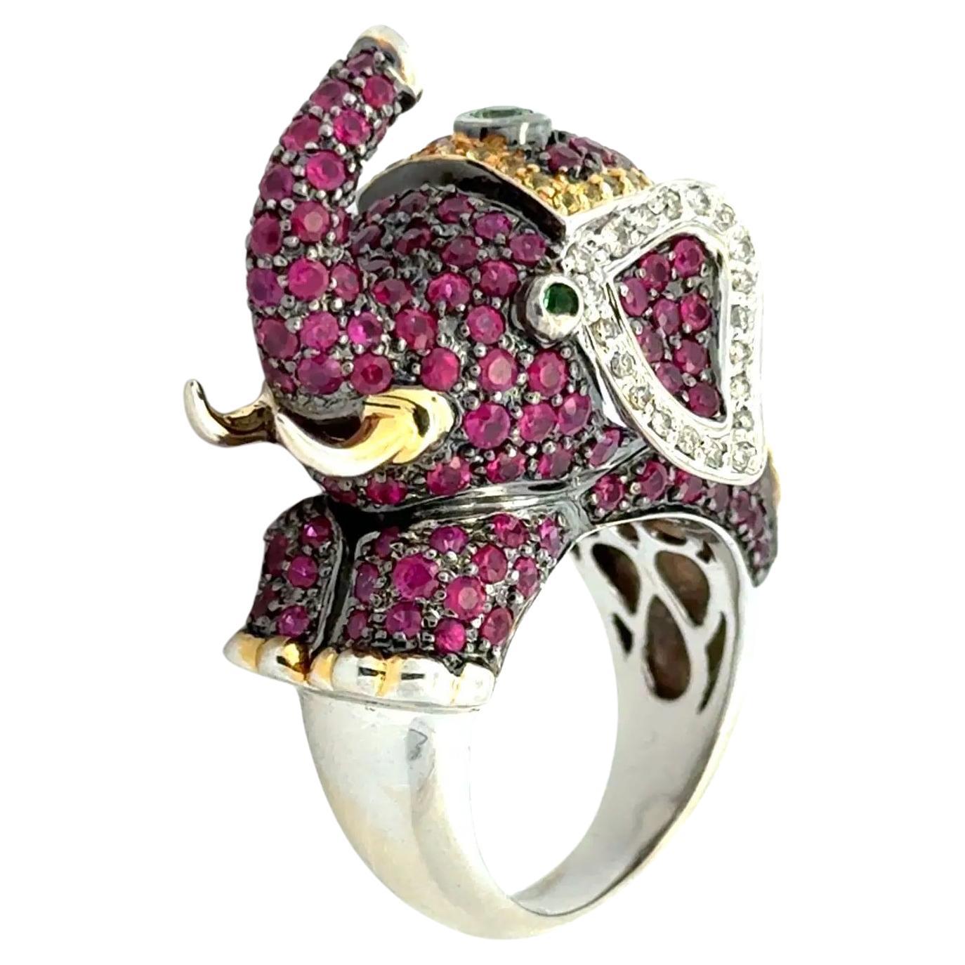 Bague vintage en or à éléphant avec rubis, saphir jaune et diamant