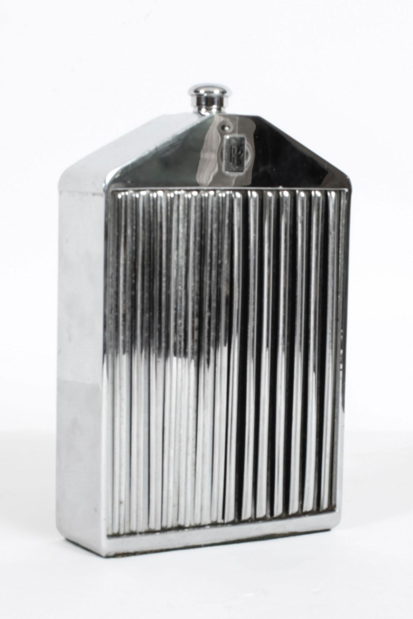 This Iconic Rolls-Royce radiator shaped decanter was made by “Ruddspeed Ltd”, “(England)”, “Reg. Design No 910435. ,circa 1960 in date.

These were sold by high end retail establishments such as Harrods of London.

The case is heavy chromium