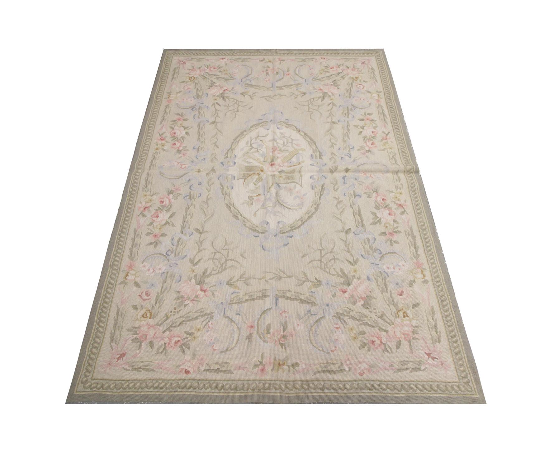Delightful floral designs sweep across all sides of this high-quality vintage Aubusson rug. handwoven in 1990 with hand-spun, vegetable-dyed wool, and cotton, by some of the finest Caucasian artisans. Perfect for both modern or traditional