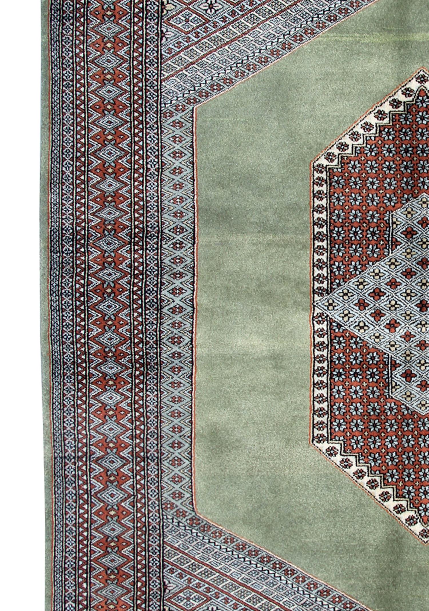 Late 20th Century Vintage Rug Green Turkmen Bukhara, Hand-Knotted Wool Carpet