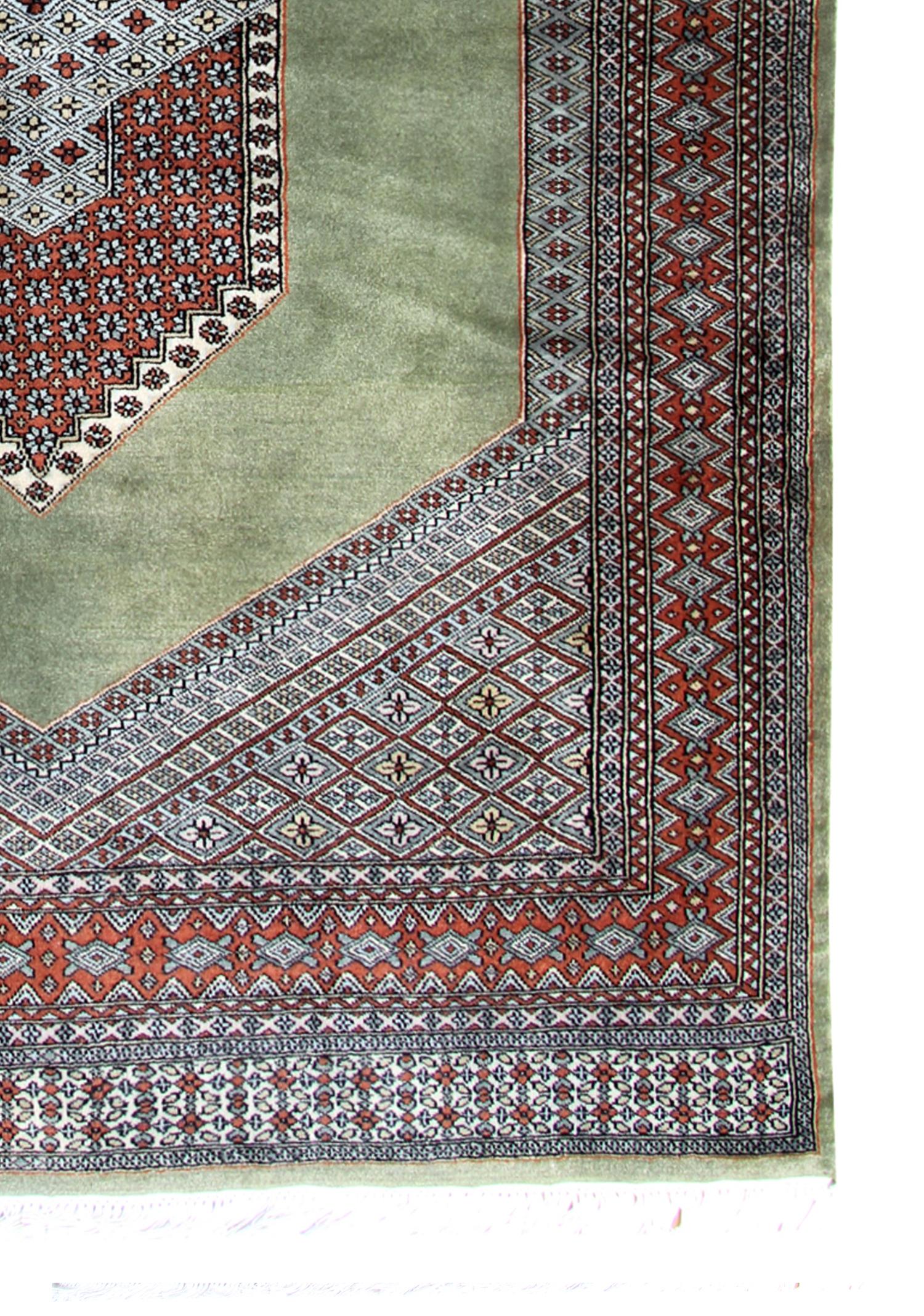 Organic Material Vintage Rug Green Turkmen Bukhara, Hand-Knotted Wool Carpet
