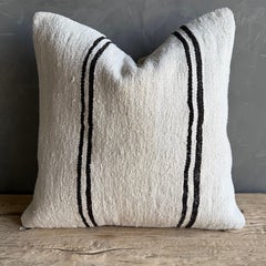 Copricuscino vintage con strisce