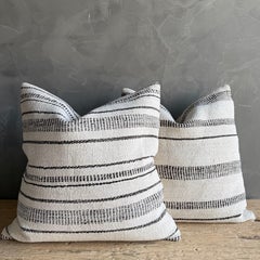 Copricuscino vintage con strisce
