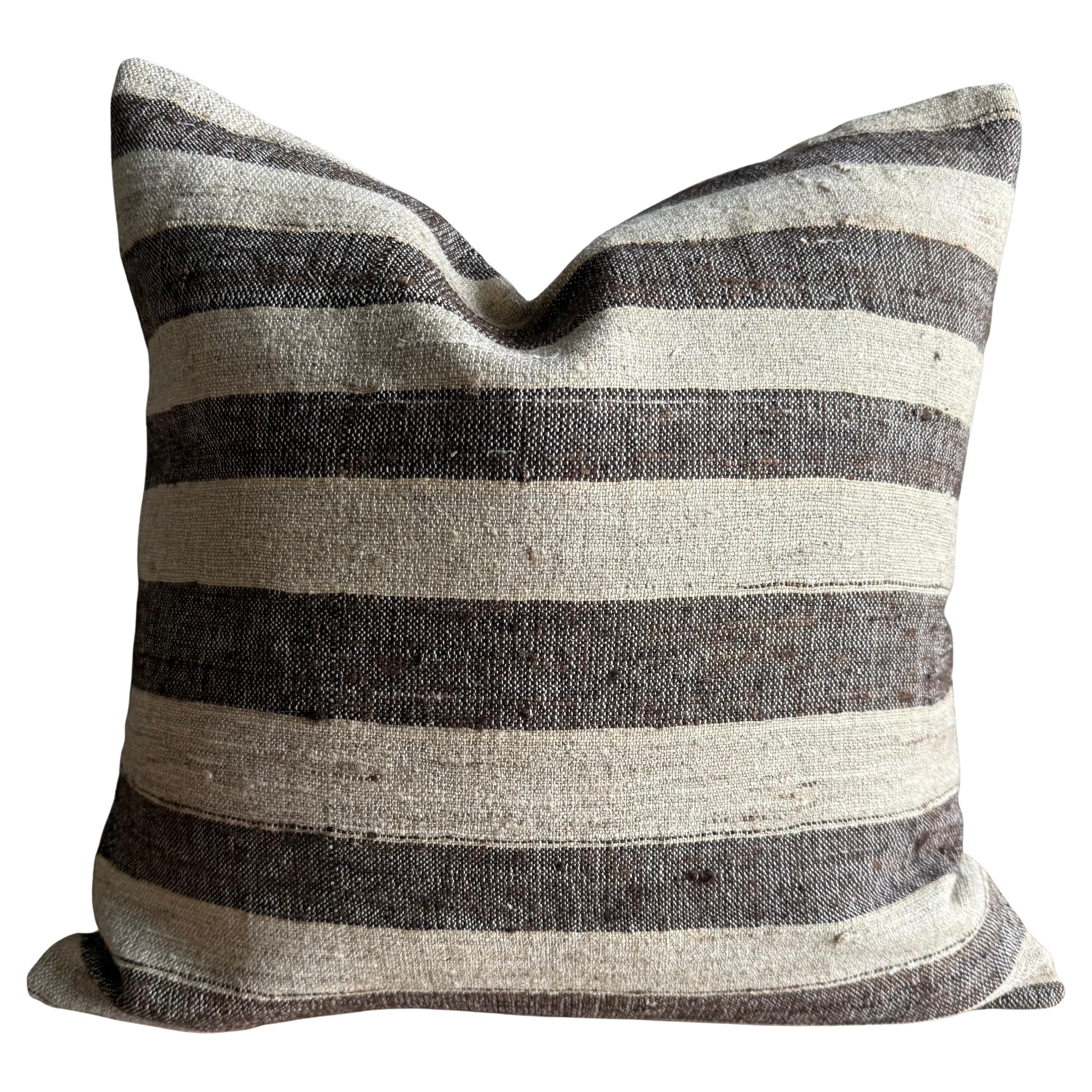 Copricuscino vintage con strisce