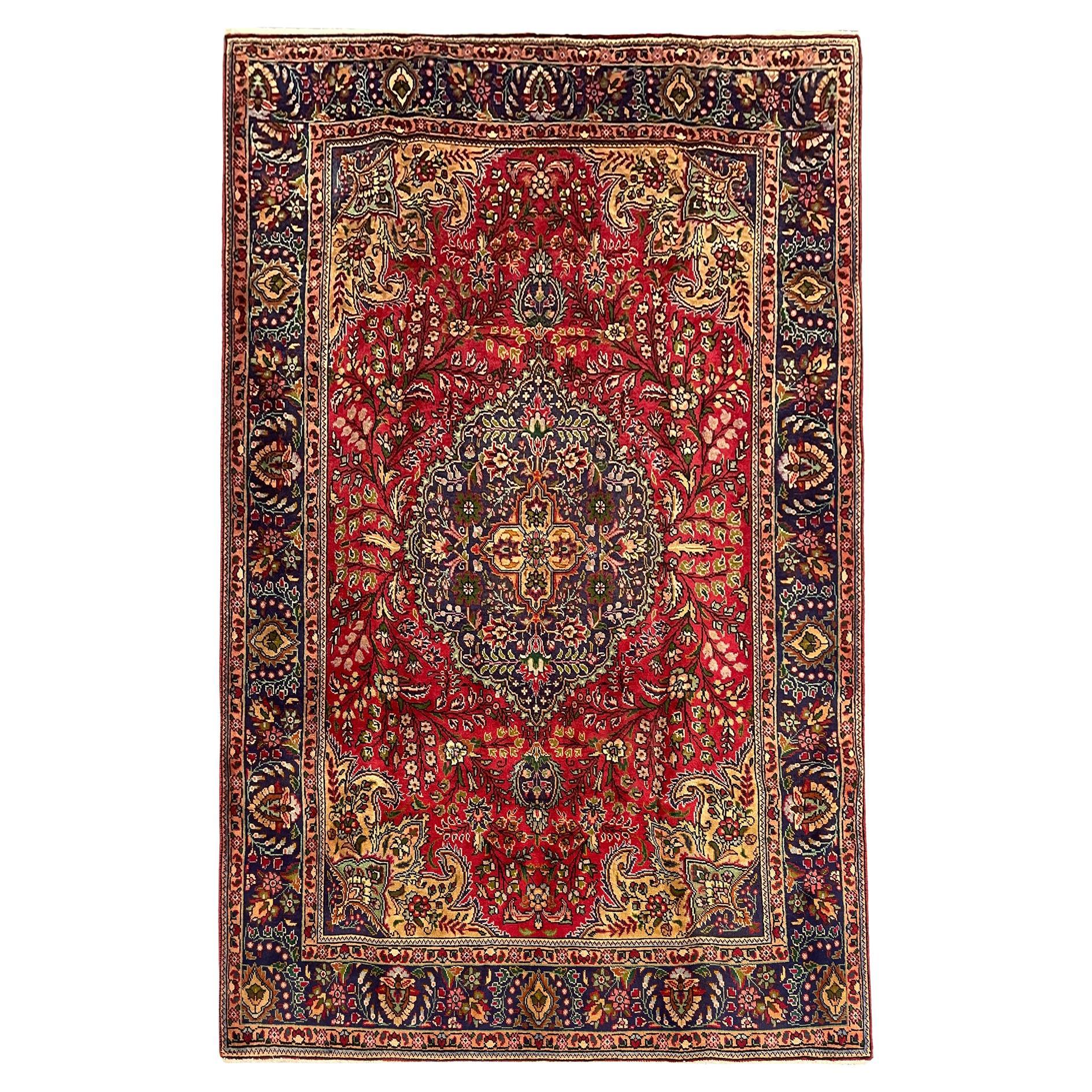Tapis vintage en laine rouge, tapis oriental tissé à la main à motifs floraux
