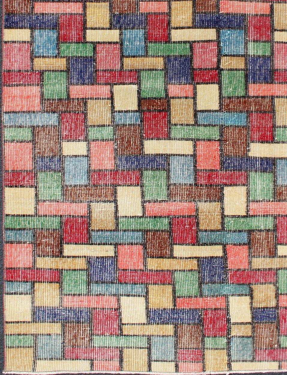 Vintage Rug with a Modern Design with Multi Colors in Square and Rectangular shapes, Keivan Woven Arts / Rug/TU-MTU-3360. Mid century modern.

This vintage rug with a Mid-Century design demonstrates a band of color surrounded by a defined contour.