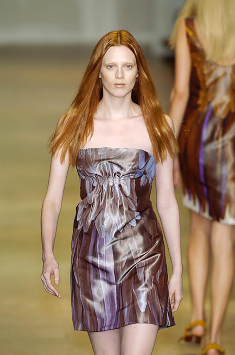Prada Feather Print Silk Taffeta Dress
Vintage Runway 2005 
Italian size 42 - US 6
100% Silk, Strapless, Inner boned bustier with padded and underwired cups, Ties on the back, Tail.
Measurements: Length 27 inches (underarm and down), Bust - 34