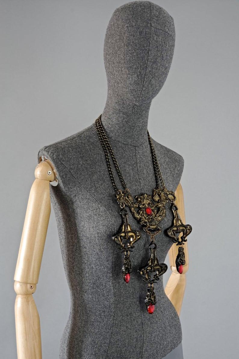Vintage Runway JEAN PAUL GAULTIER Gothic Baroque Plastron Breastplate Necklace

Measurements:
Height: 9.45 inches (24 cm)
Width: 9.45 inches (24 cm)
Length: 22.83 inches (58 cm)

Unsigned Gaultier piece and Museum worthy.

Features:
- 100% Authentic