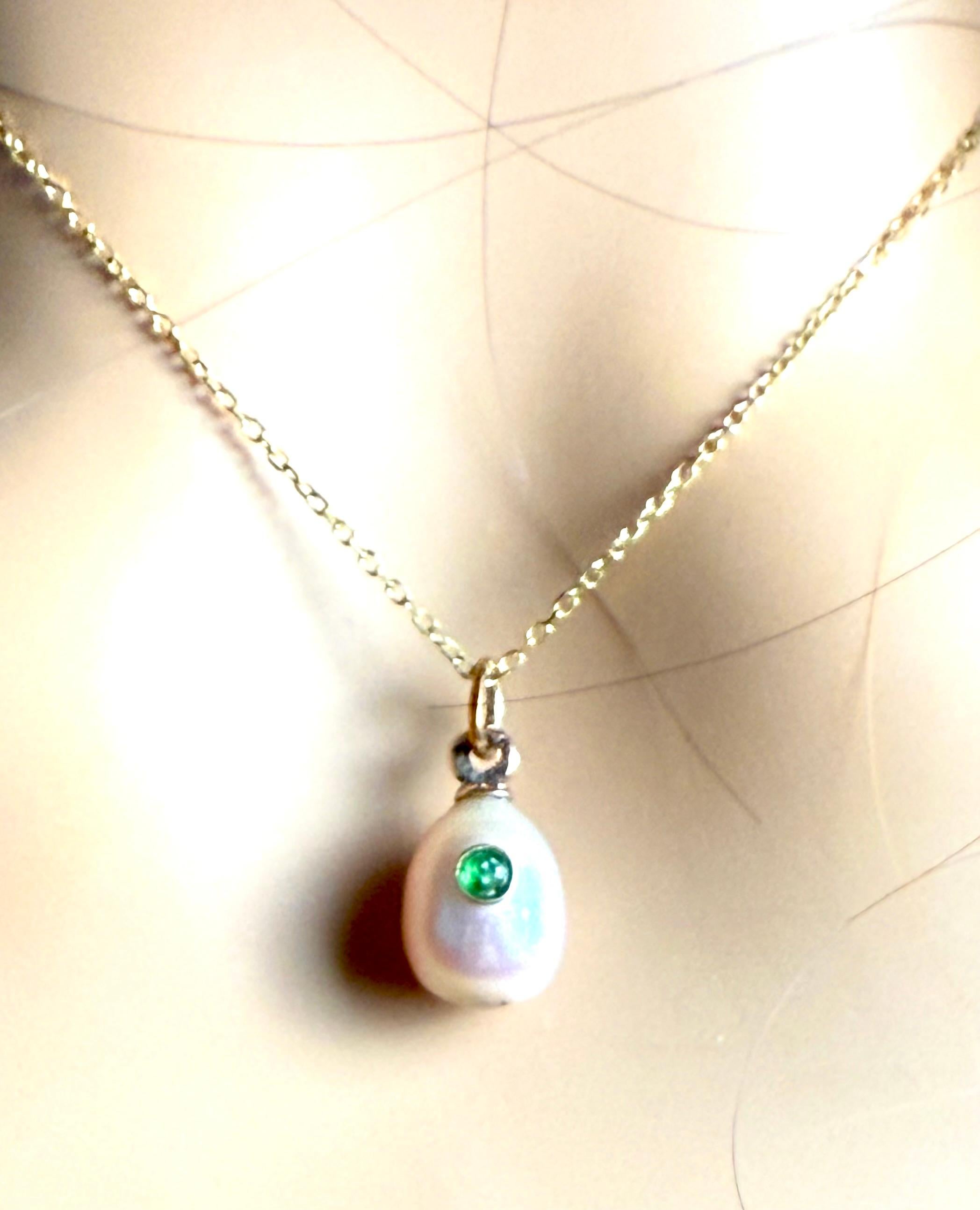 Discover the captivating allure of this vintage Russian 14K gold egg-shaped pendant, a miniature masterpiece that embodies the rich heritage of Imperial Russian craftsmanship. 

This exquisite piece features a luminous freshwater pearl, meticulously