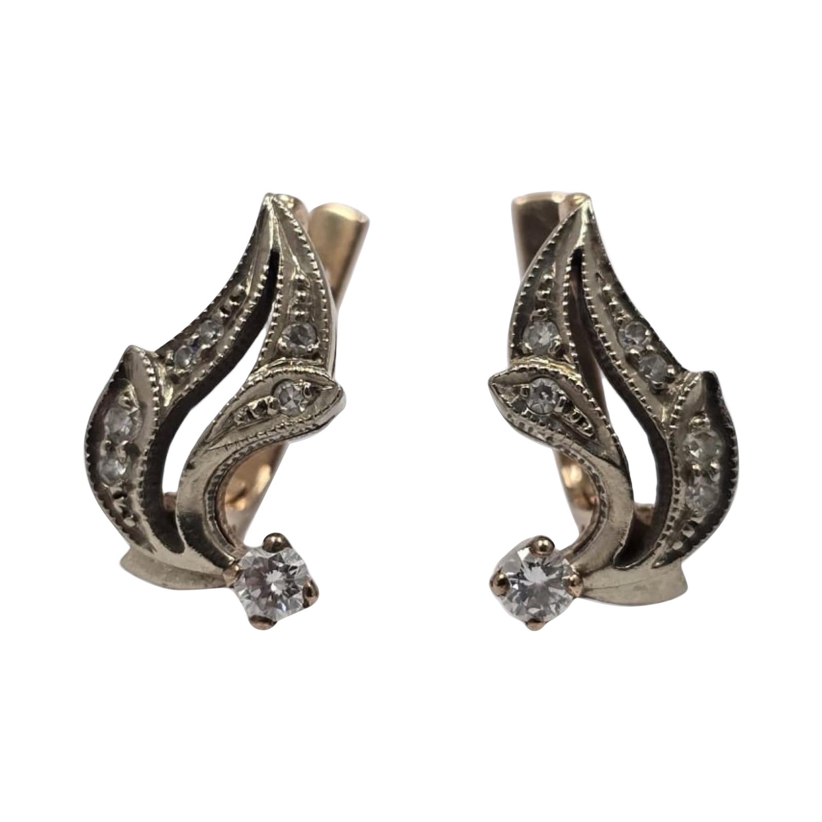 Orecchini russi d
epoca in 14K con diamanti bicolore da 0,42 carati - Motivo a fiamma deco