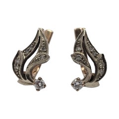 Orecchini russi d
epoca in 14K con diamanti bicolore da 0,42 carati - Motivo a fiamma deco