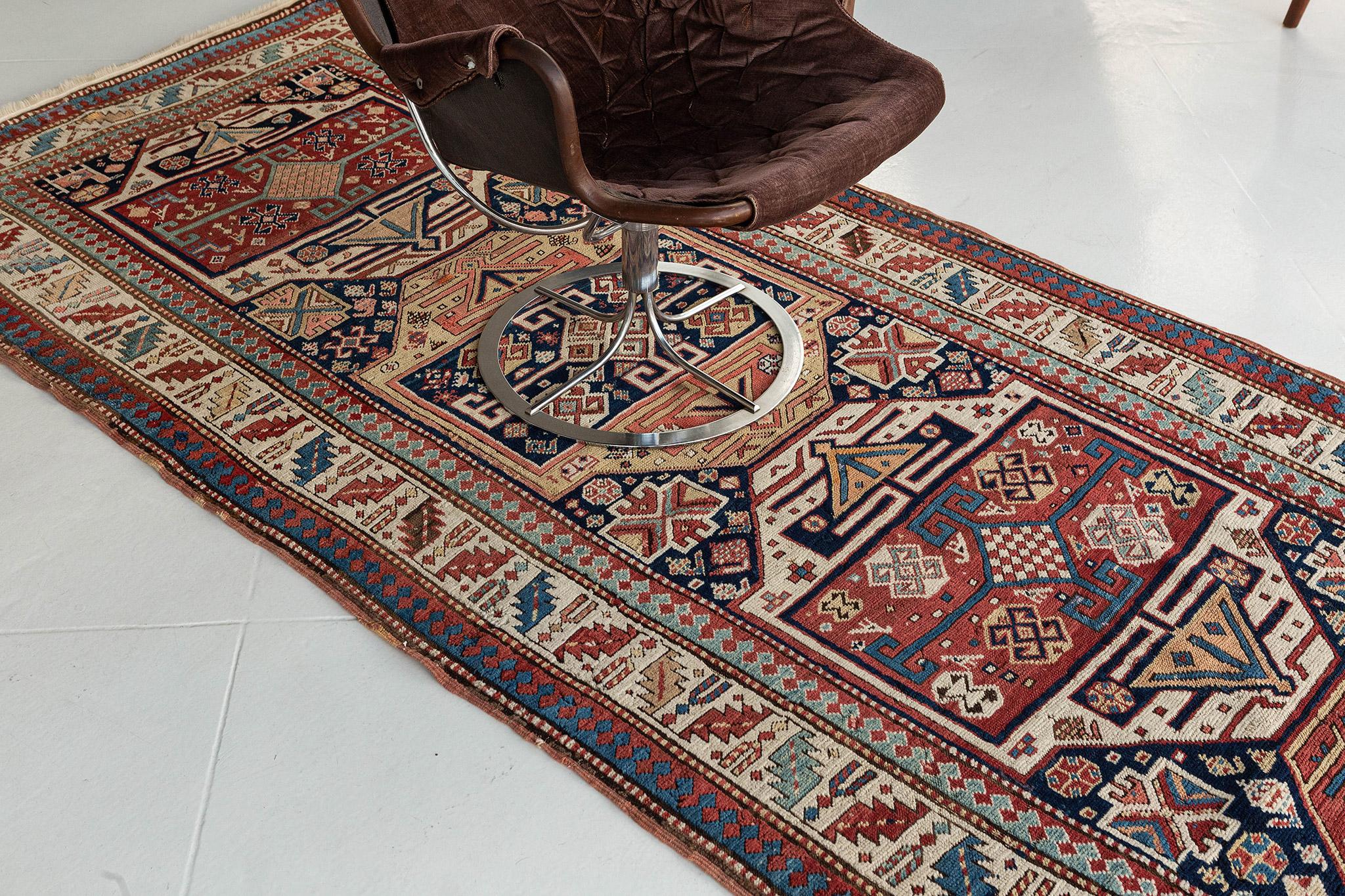 Our traditional Russian Kazak runner vintage rug is inspired by tribal patterns. This hallway rug is a deal for flooring or wall applications. It is embellished with motifs and Russian tribal symbols and surrounded by geometrical patterns that make
